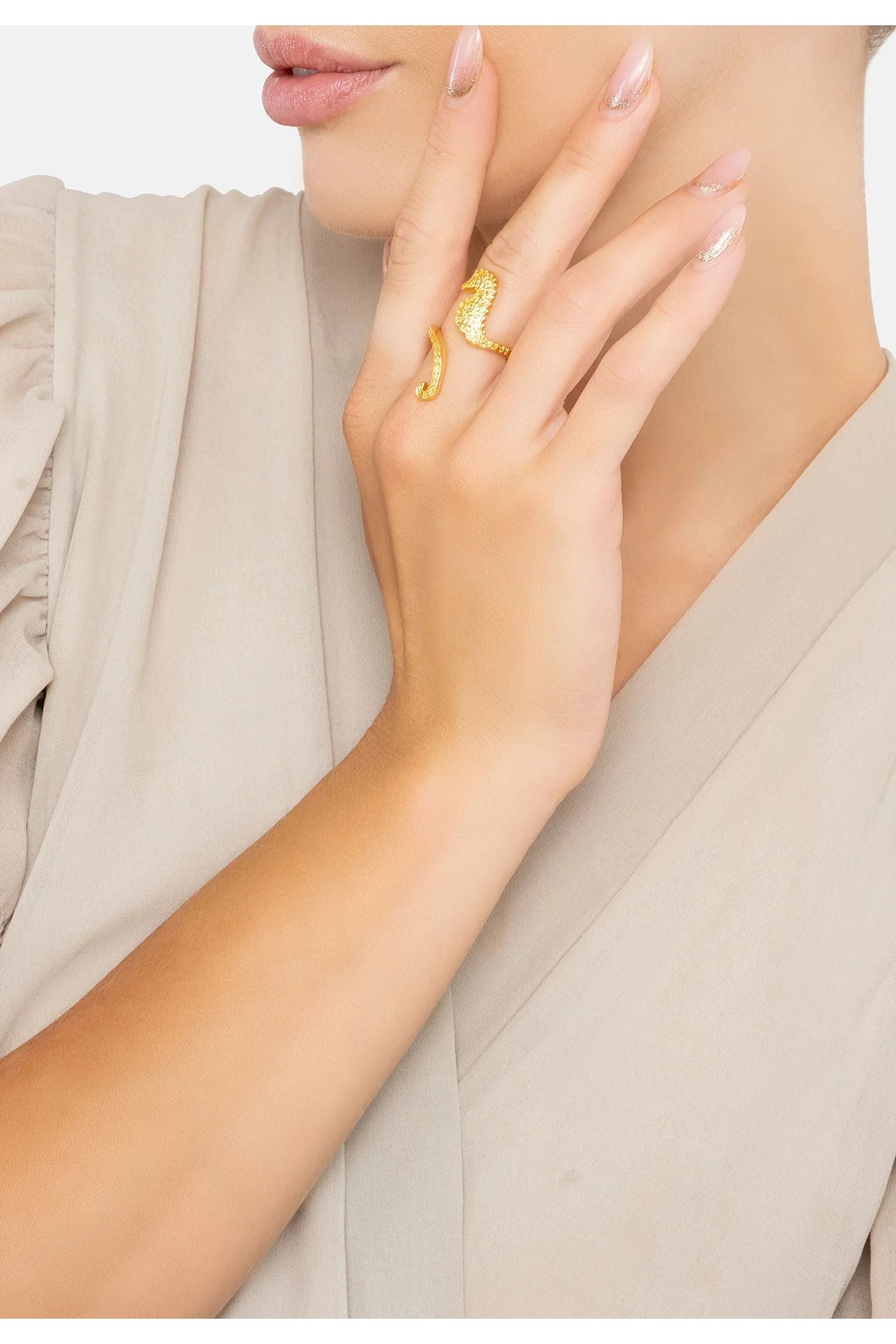 The ring worn by a model.