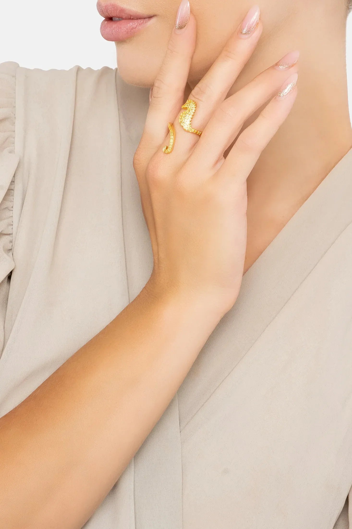 The ring worn by a model.