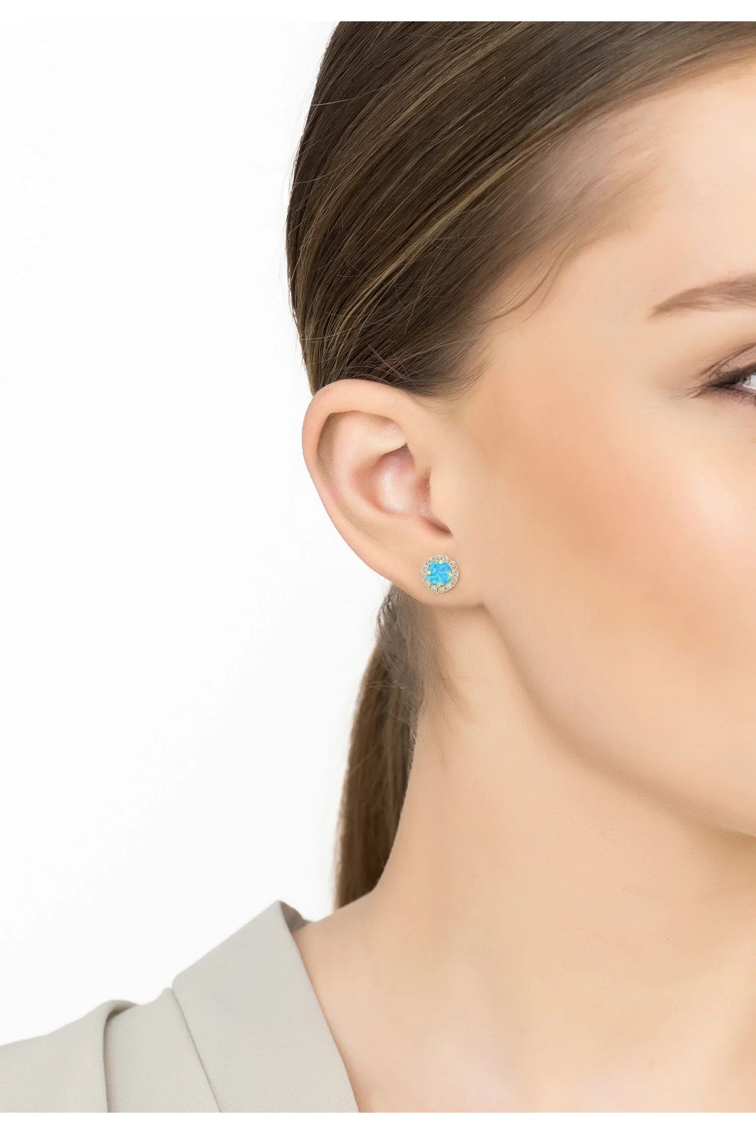 The earring worn by a model.
