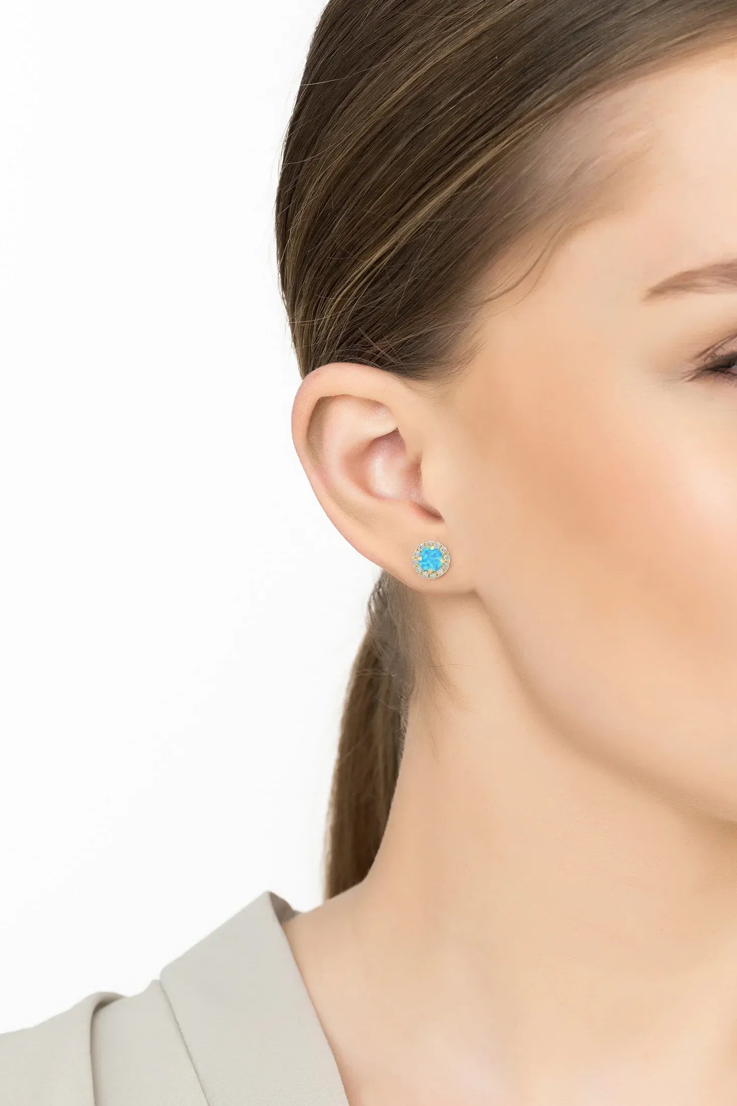The earring worn by a model.