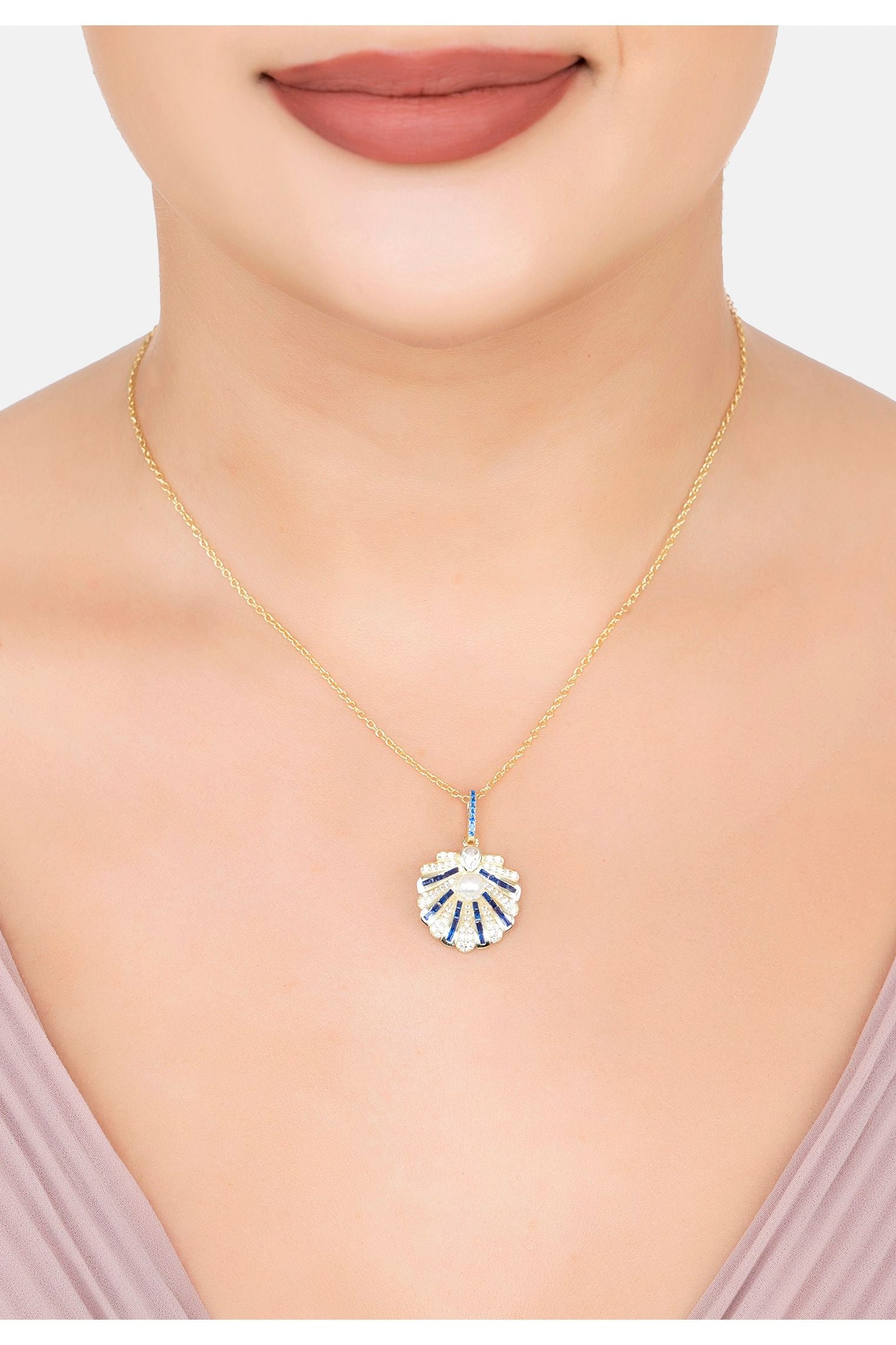 The necklace worn by a model.