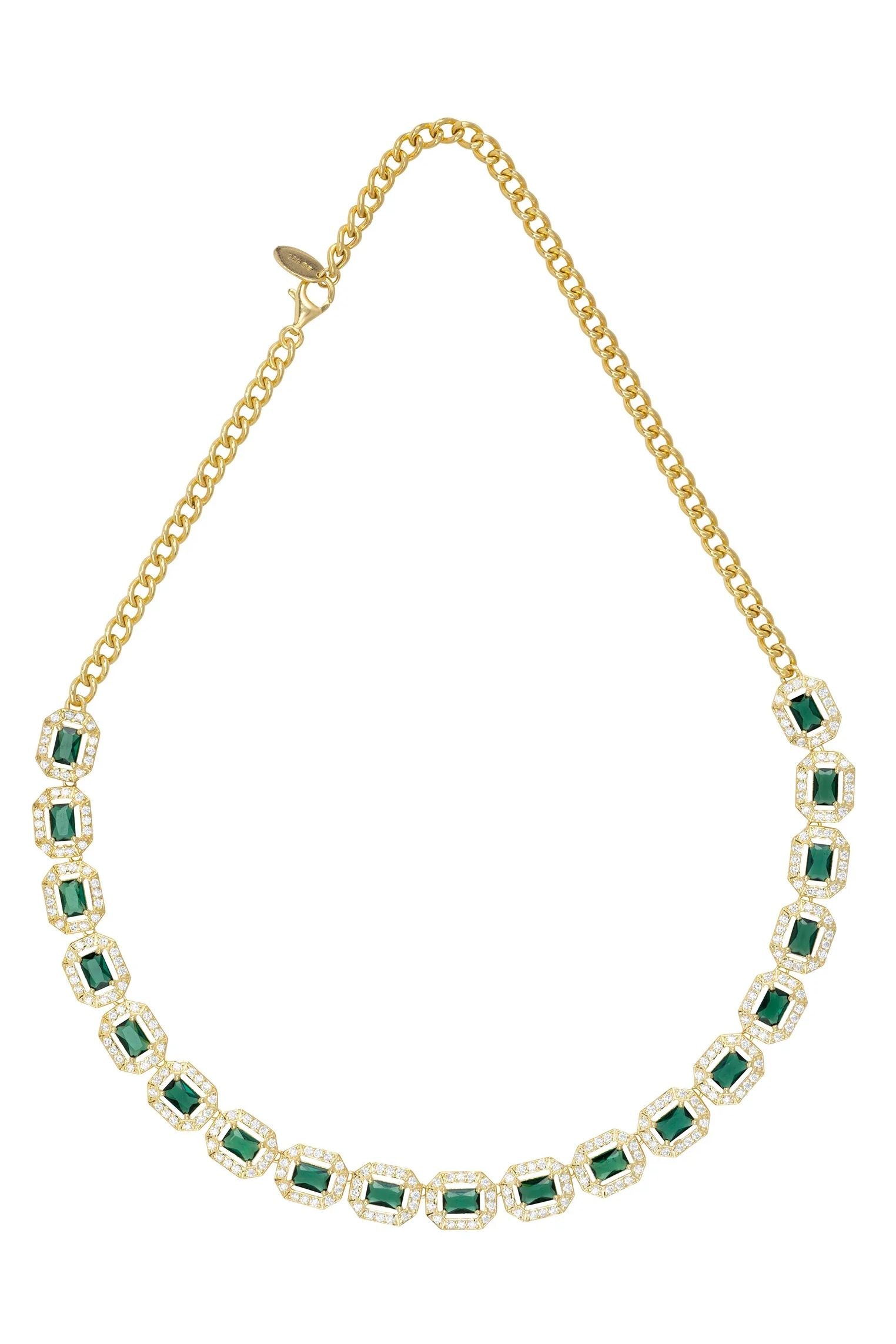 Gold and diamond halo emerald necklace.