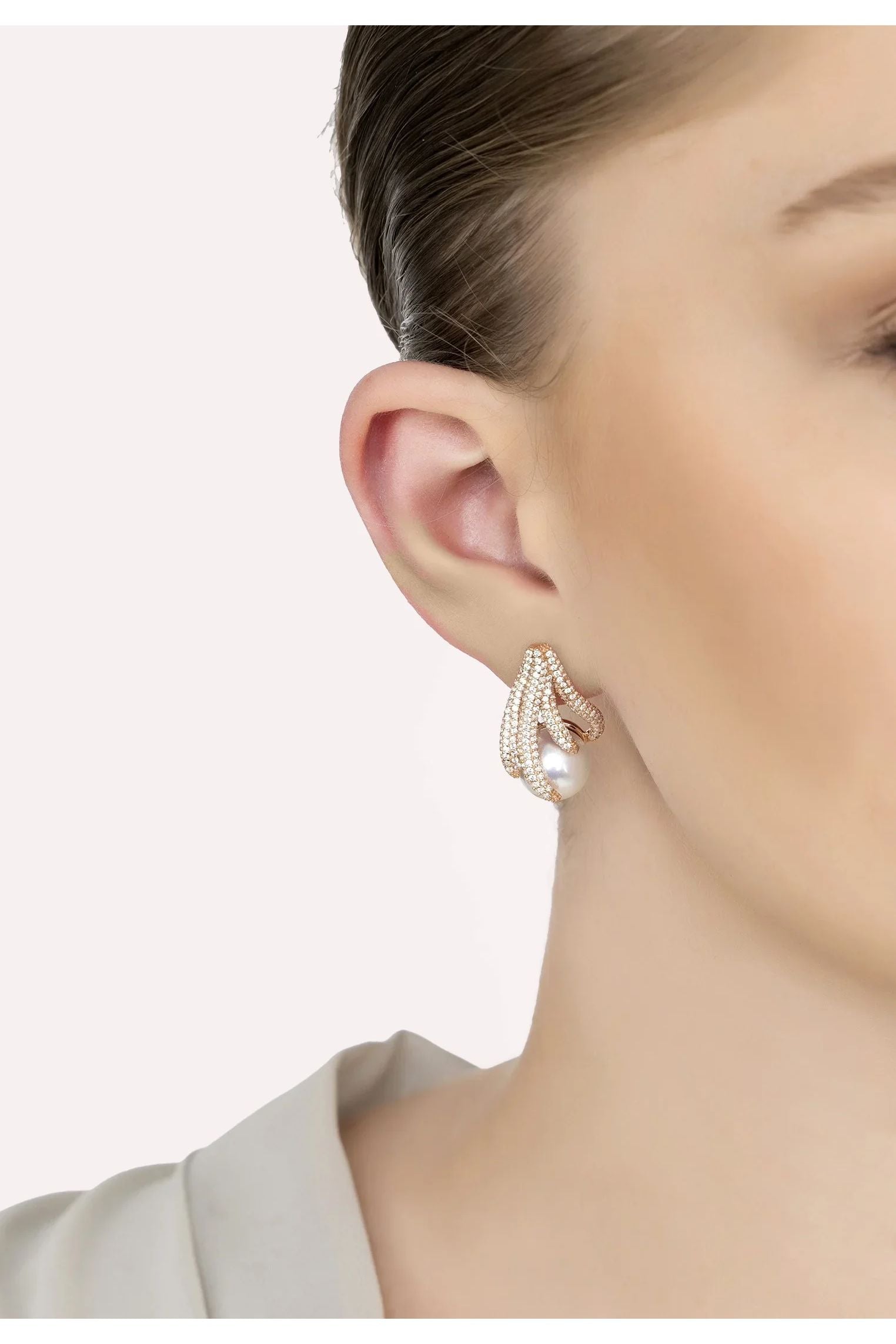 The earring worn by a model.