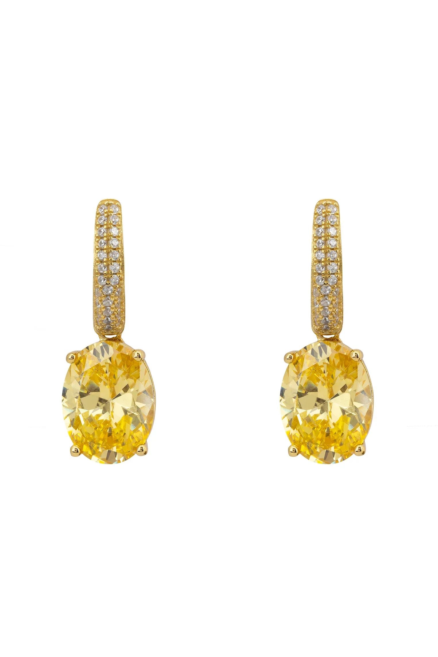 Oval yellow gemstone gold earrings.