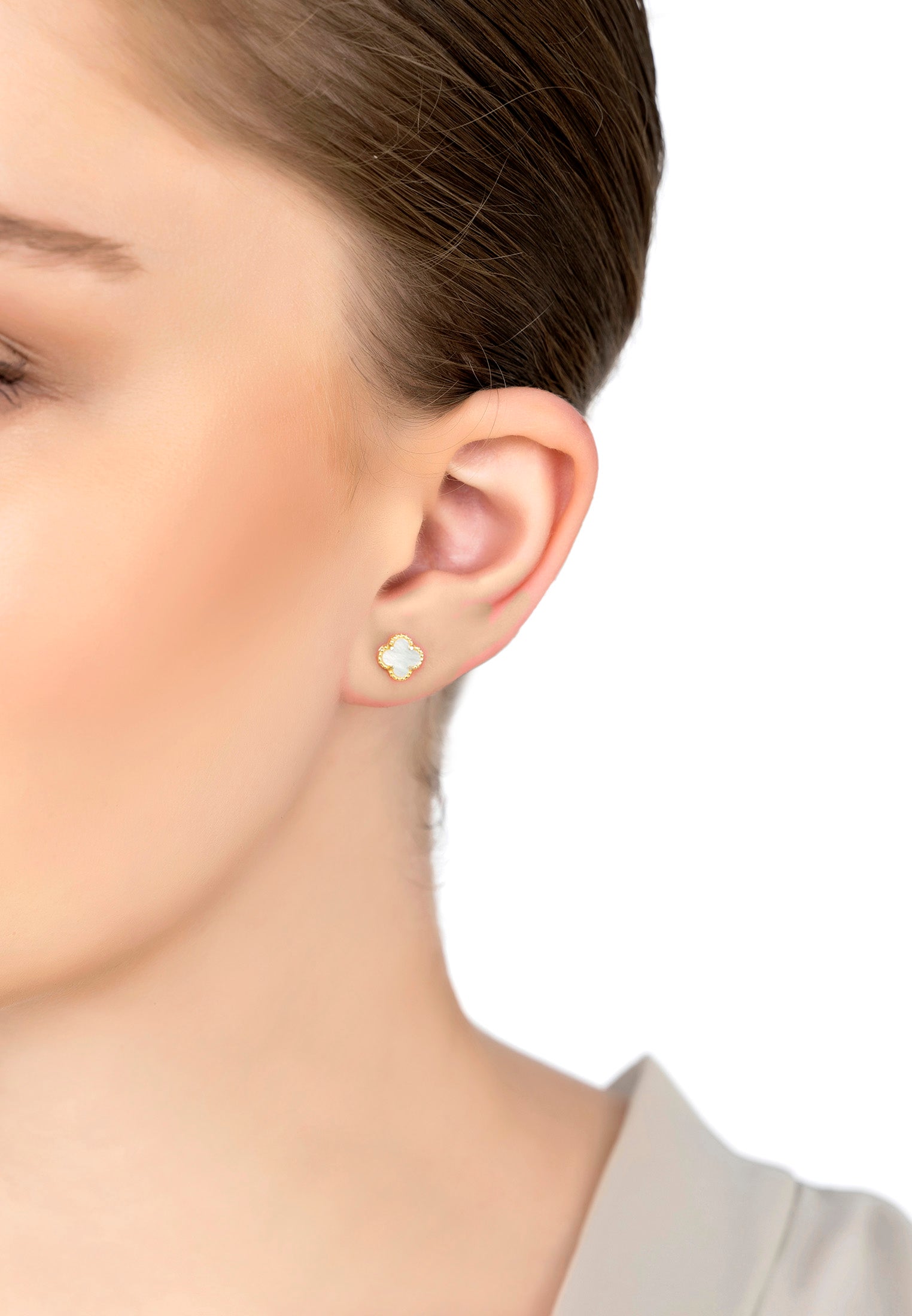 The earring worn by a model.