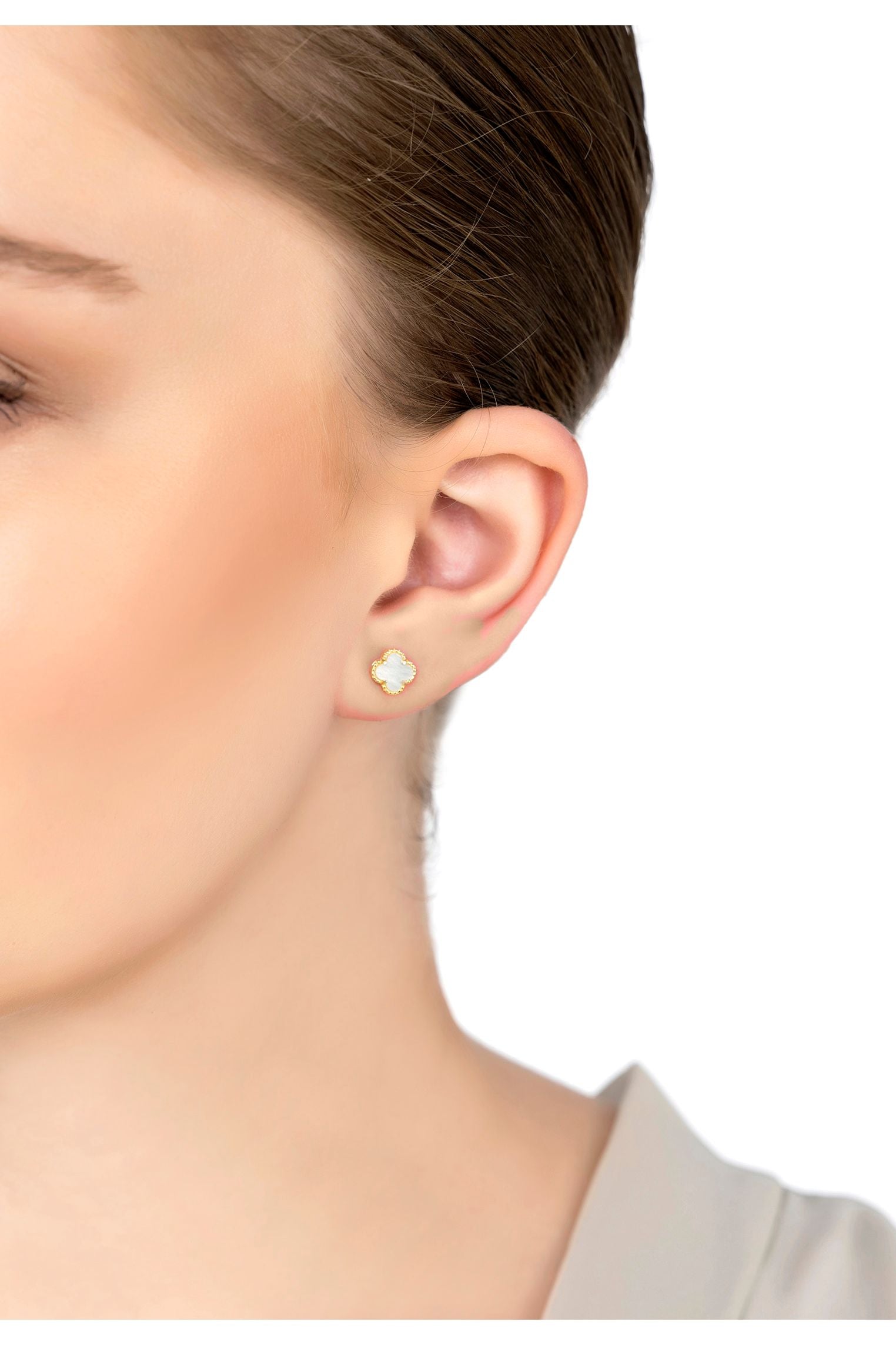 The earring worn by a model.