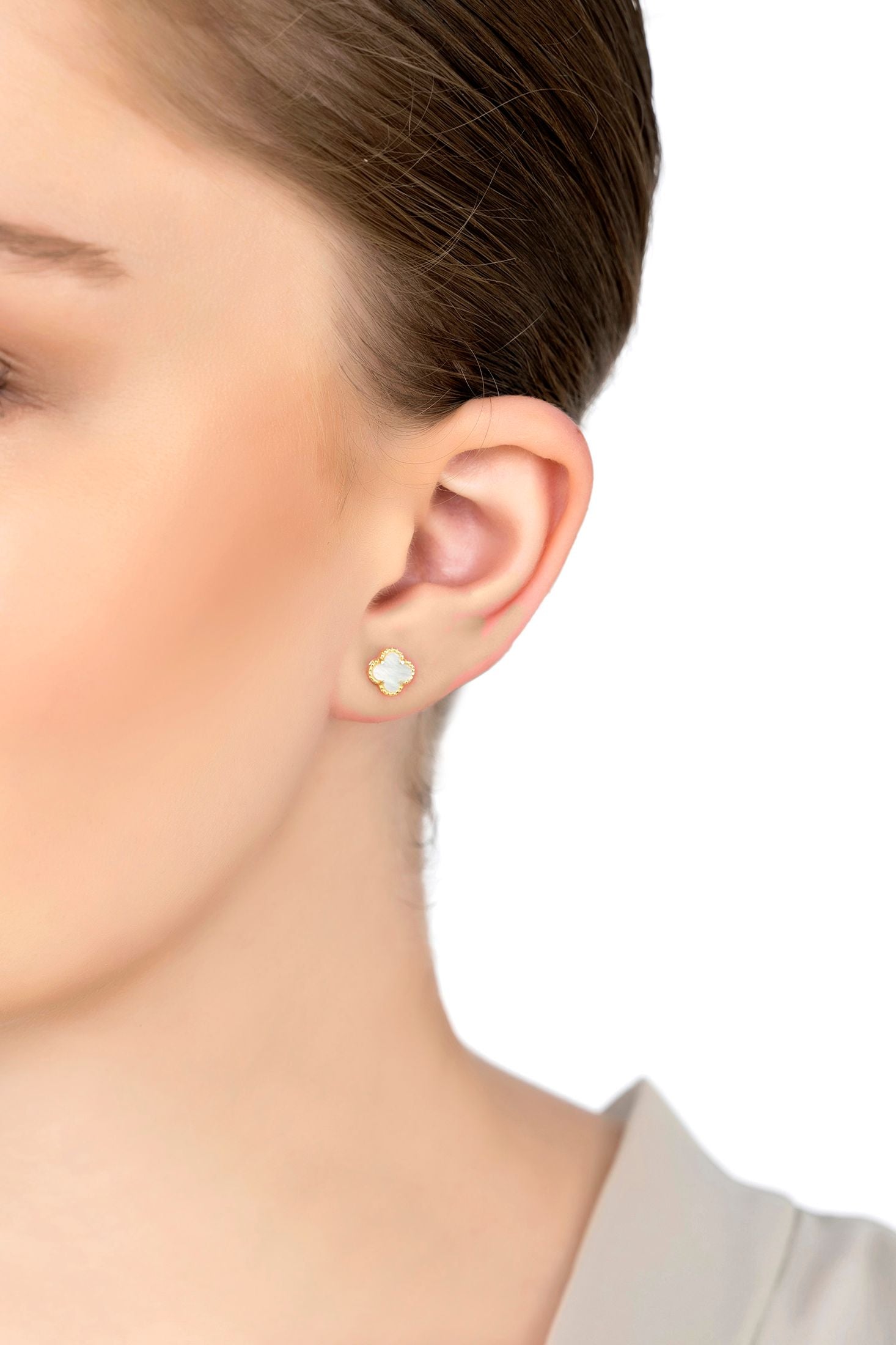 The earring worn by a model.