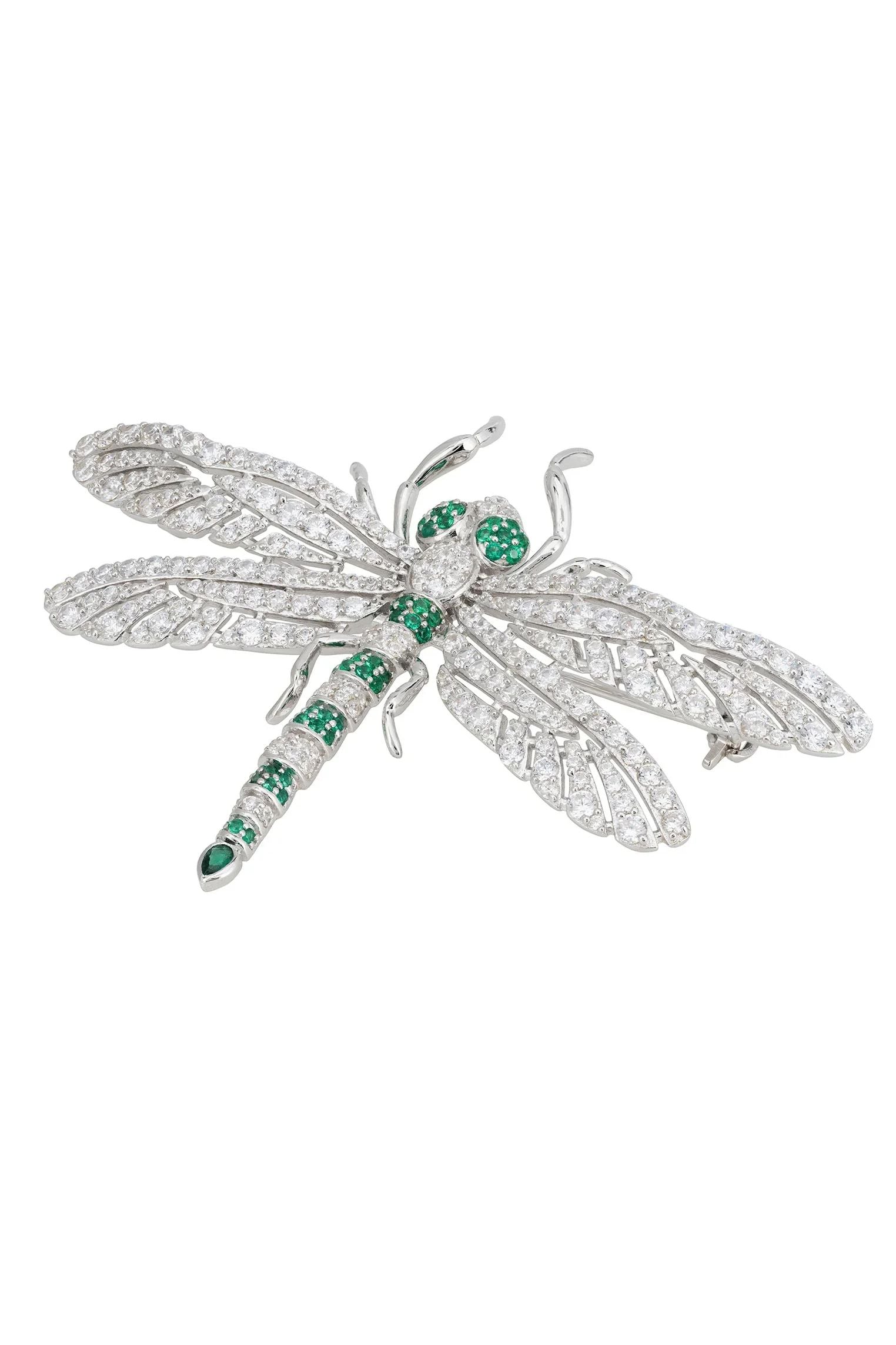 Emerald and silver dragonfly brooch.