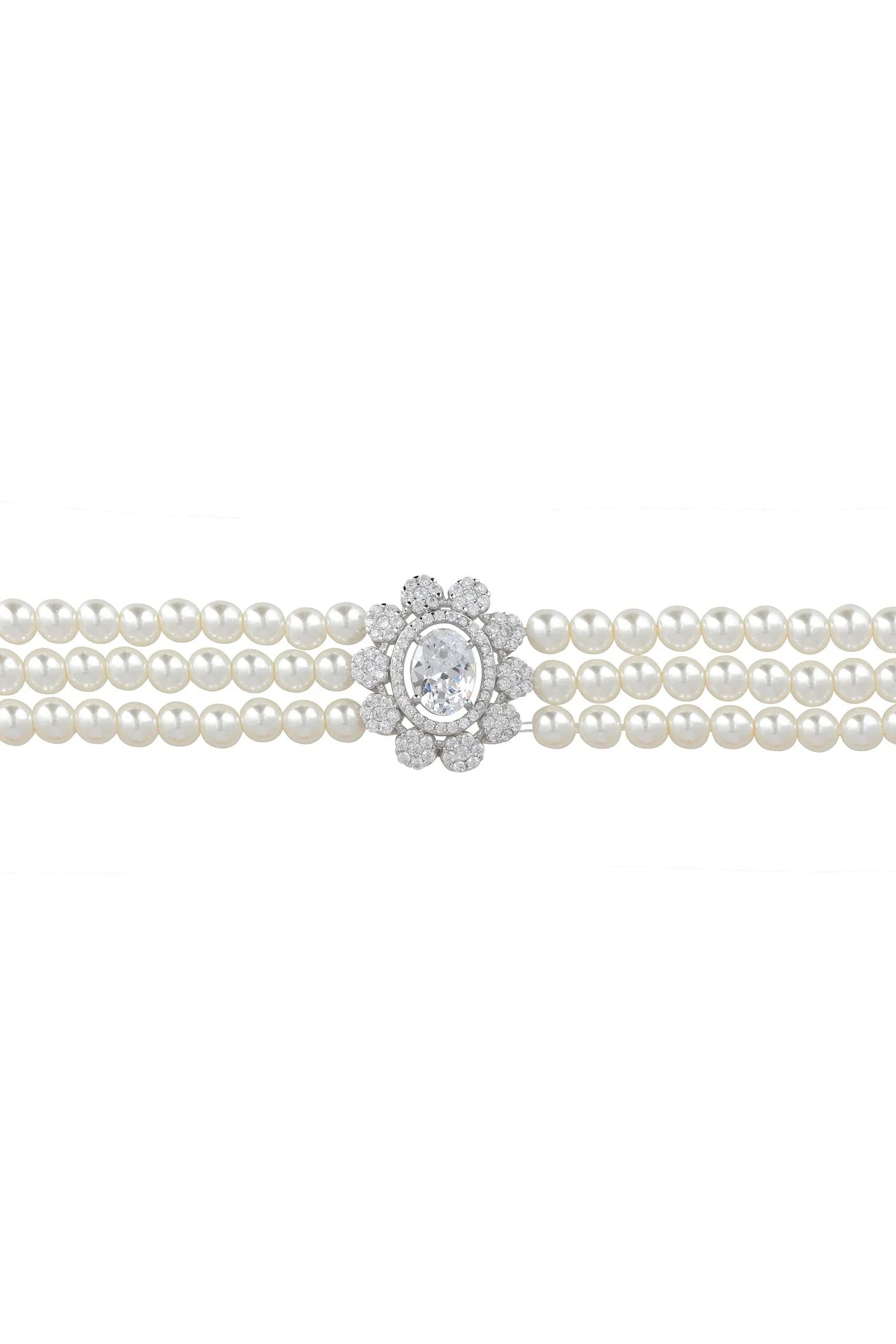 Diamond centerpiece multi-strand pearl bracelet.