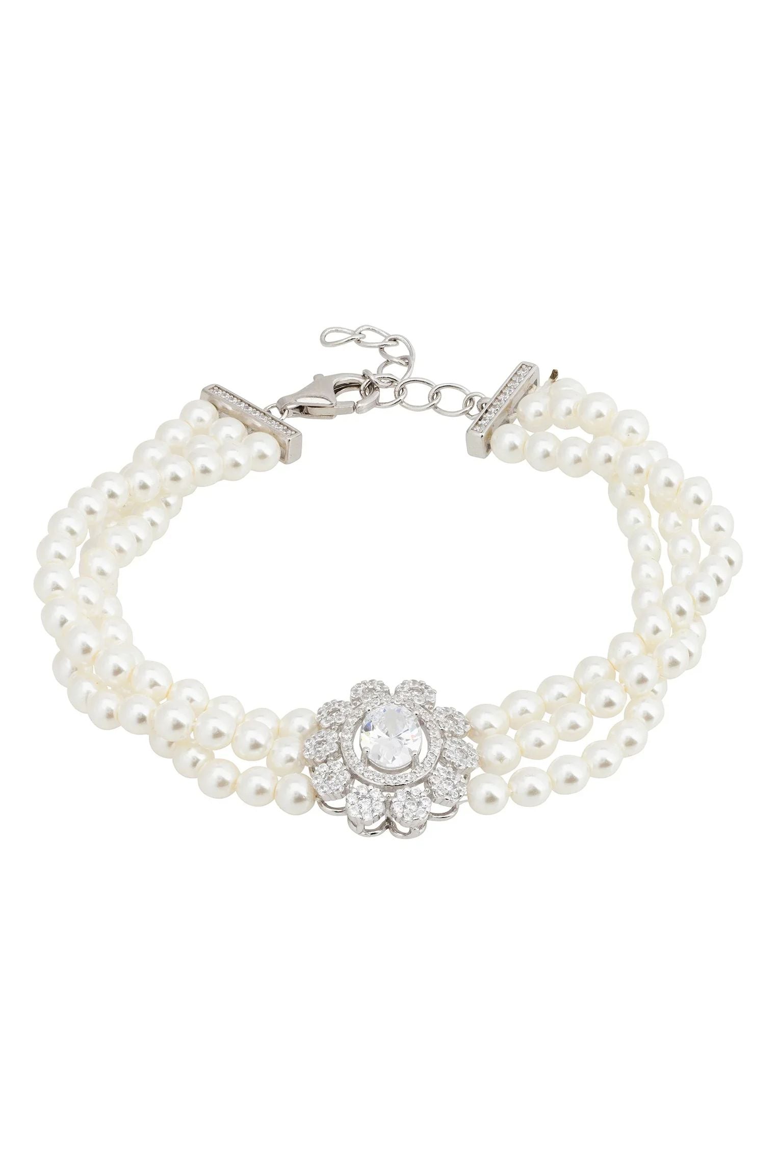 Diamond centerpiece multi-strand pearl bracelet.