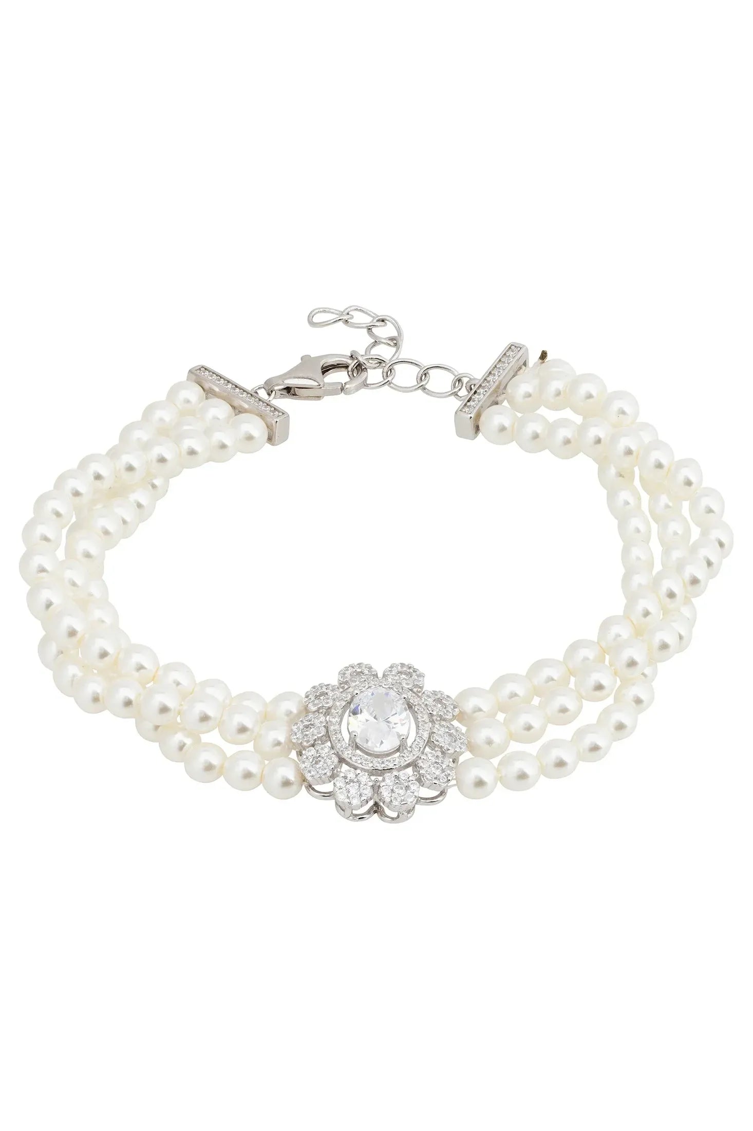 Diamond centerpiece multi-strand pearl bracelet.
