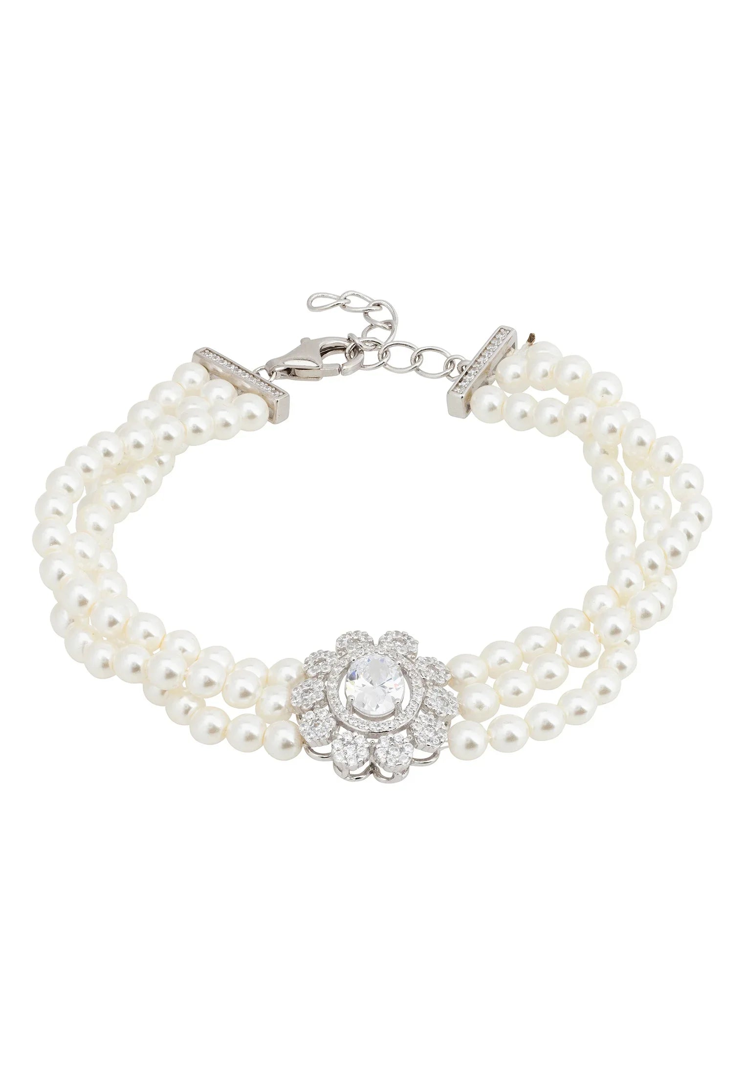 Diamond centerpiece multi-strand pearl bracelet.
