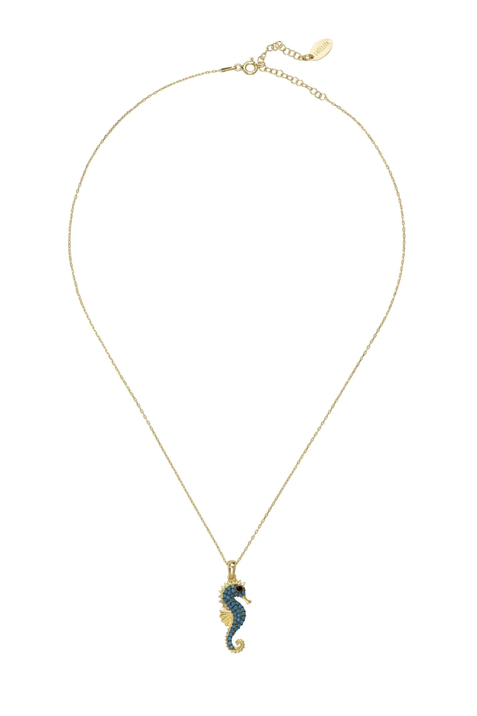 Turquoise and gold seahorse necklace.