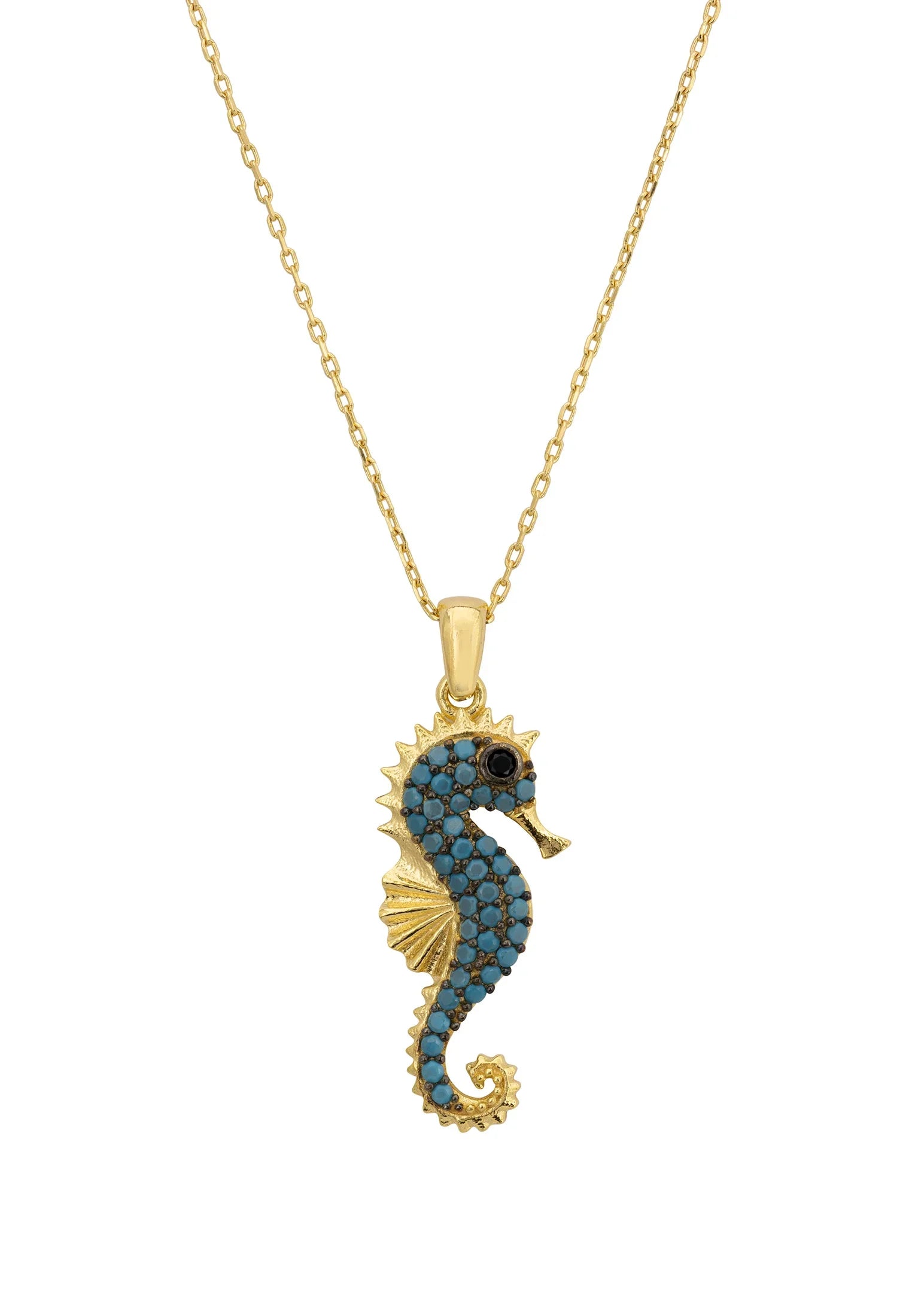 Close-up of the turquoise and gold seahorse pendant.