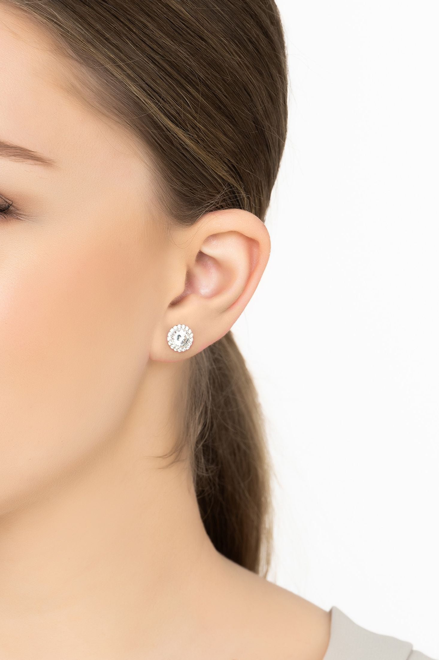 Angled view of Aspen Moissanite Stud Earrings Silver, showing silver finish and the jewellery profile.