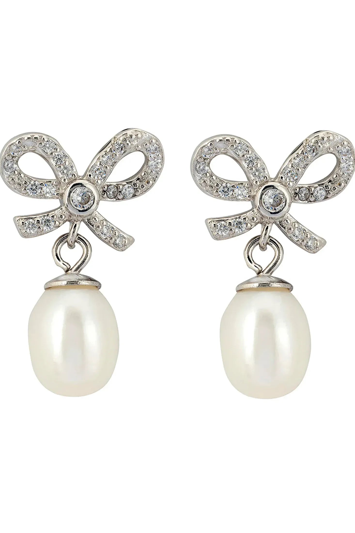 Pearl and diamond bow earrings.