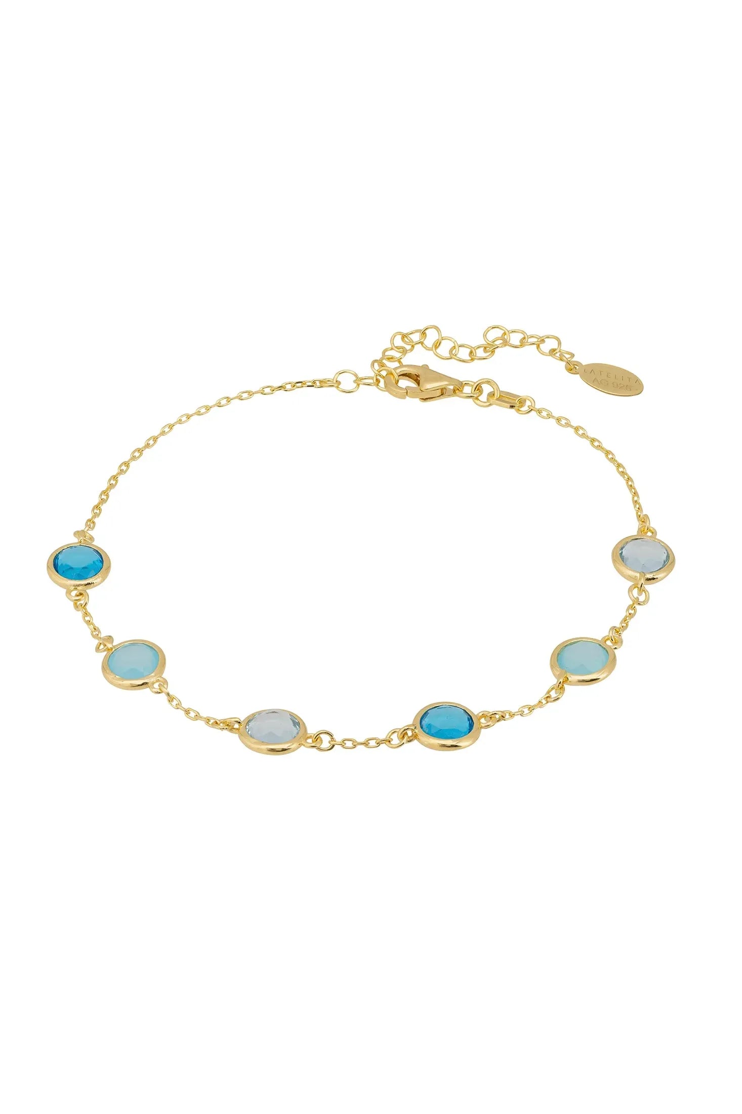 Front view of Sardinia Bracelet Gold The Blues, showing heart design, blue topaz and chalcedony detailing, gold finish.