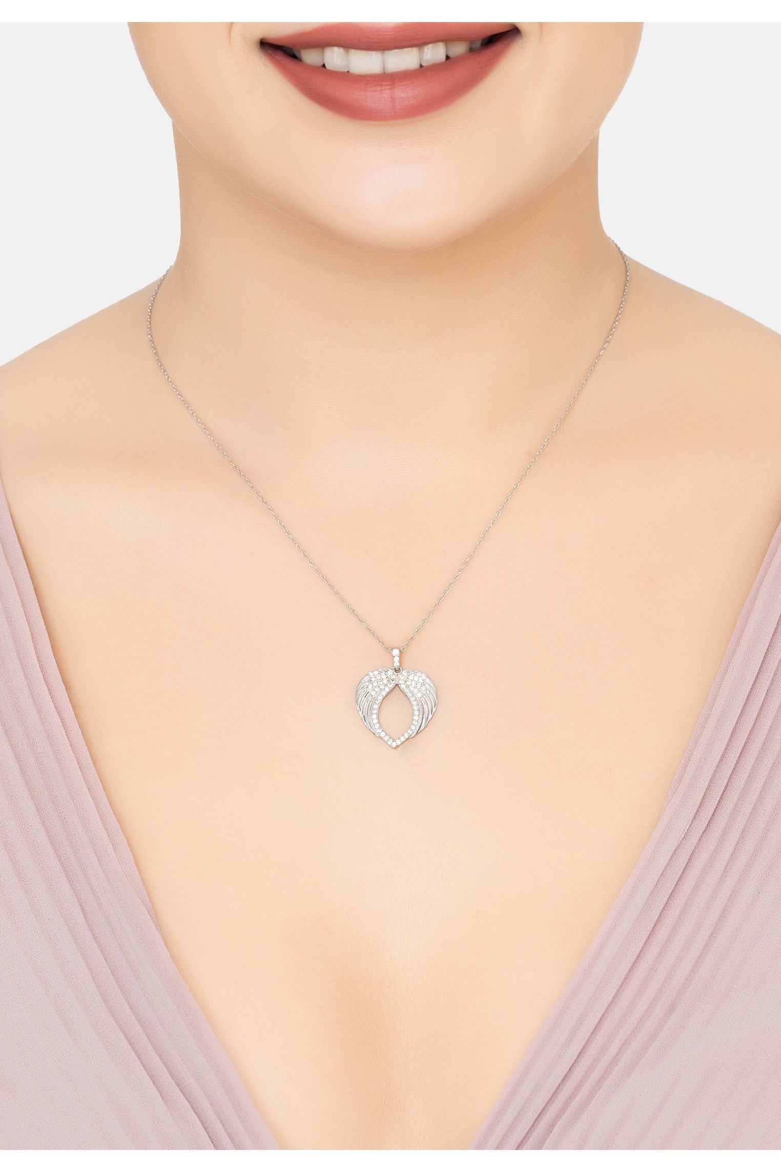 The necklace worn by a model.
