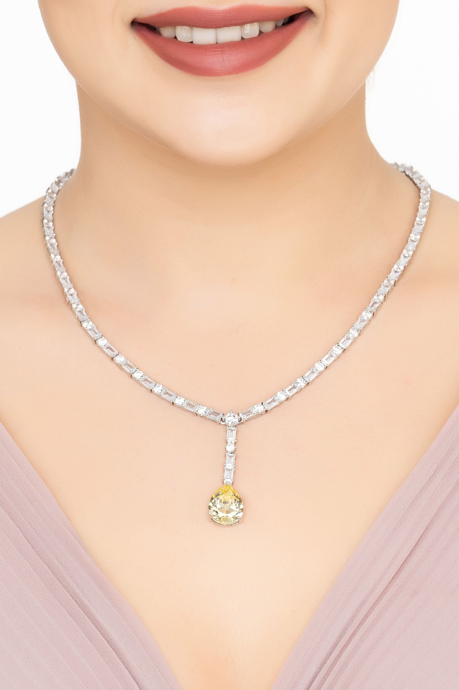 Angled view of Claudette Statement Necklace Silver Yellow Topaz, showing silver finish and the jewellery profile.