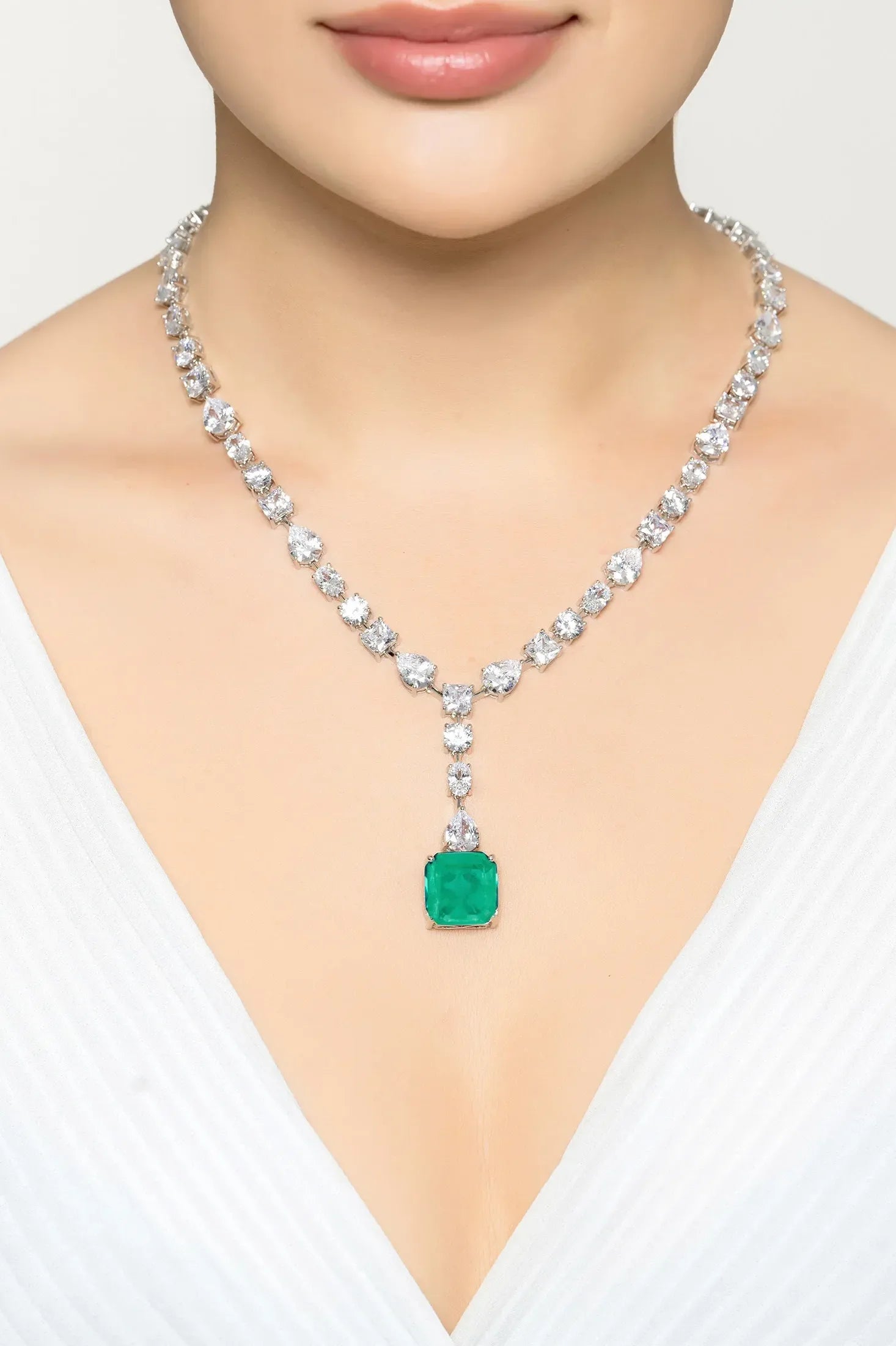 The necklace worn by a model.