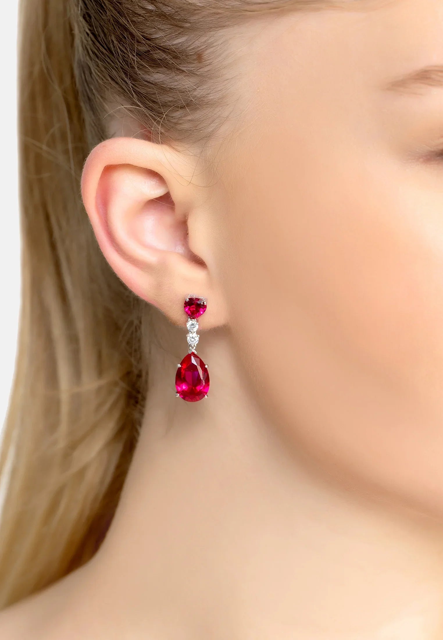 The earring worn by a model.