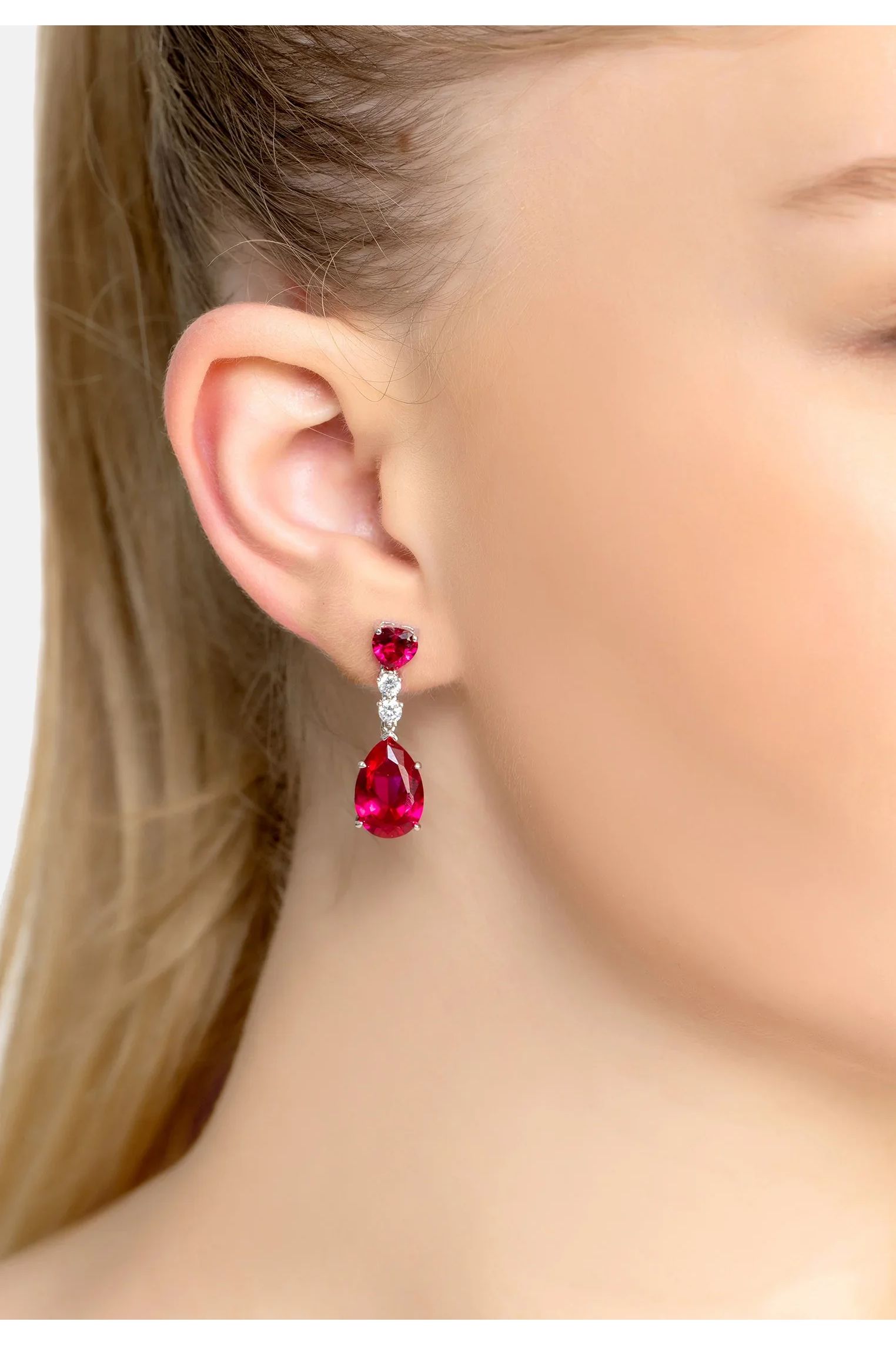 The earring worn by a model.