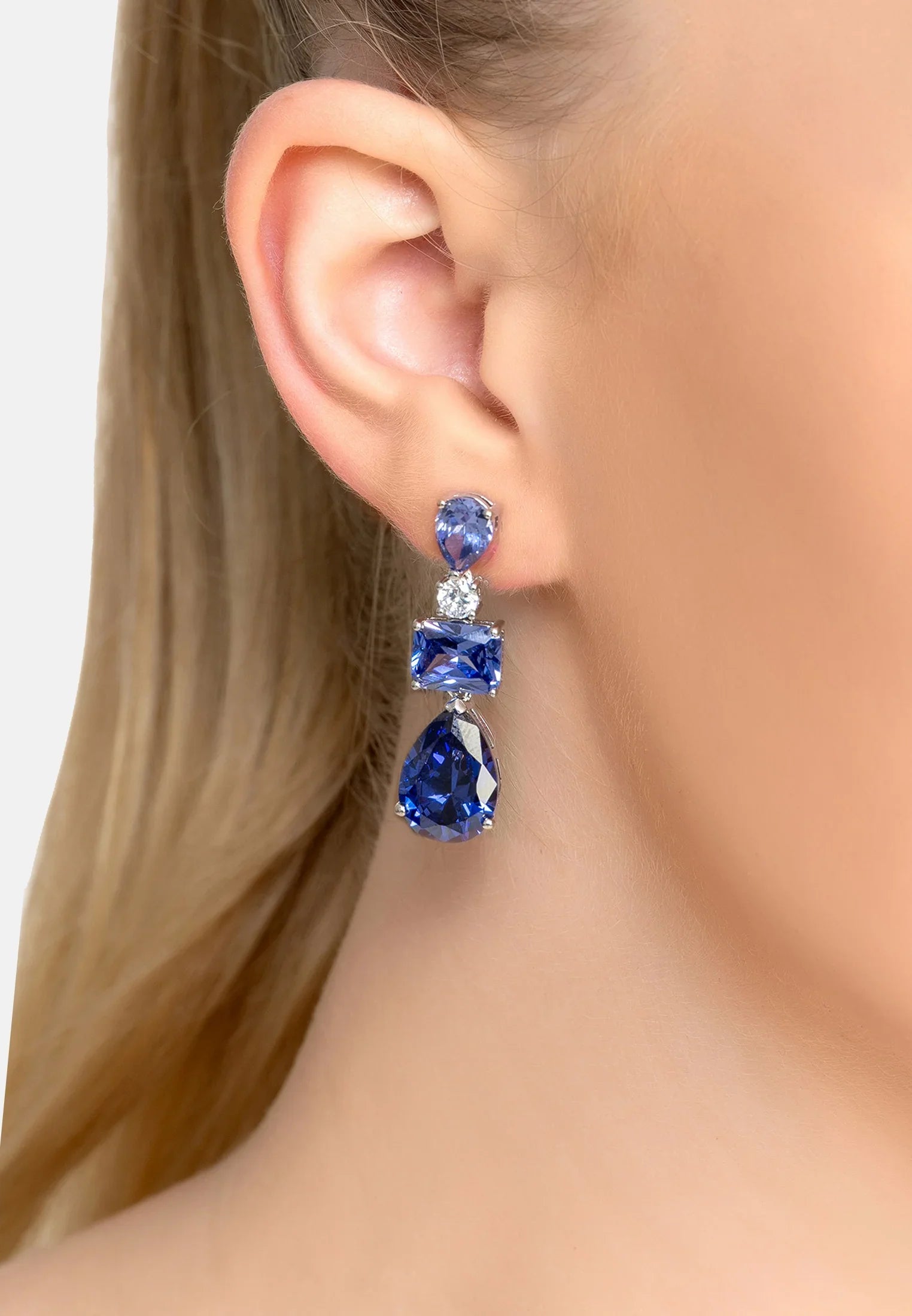 The earring worn by a model.