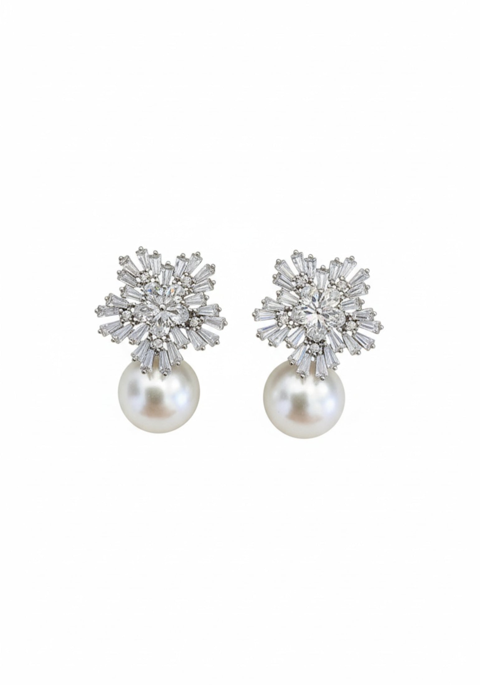 Rhodium plated starburst flower and pearl earrings with cubic zirconia.