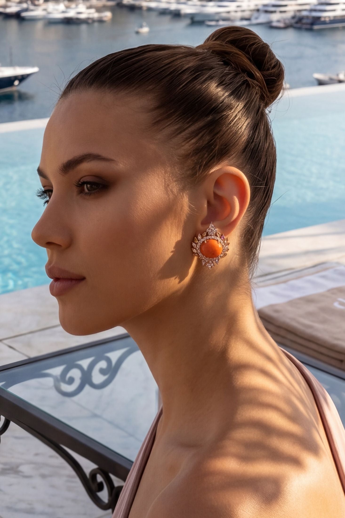 Angled view of Francesca Pink Coral Stud Earrings Gold, showing gold finish and the jewellery profile.
