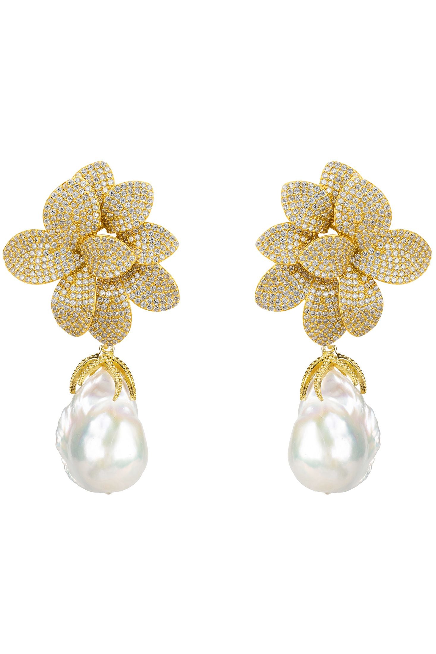 Gold flower-shaped earrings with pearl drops on a white background