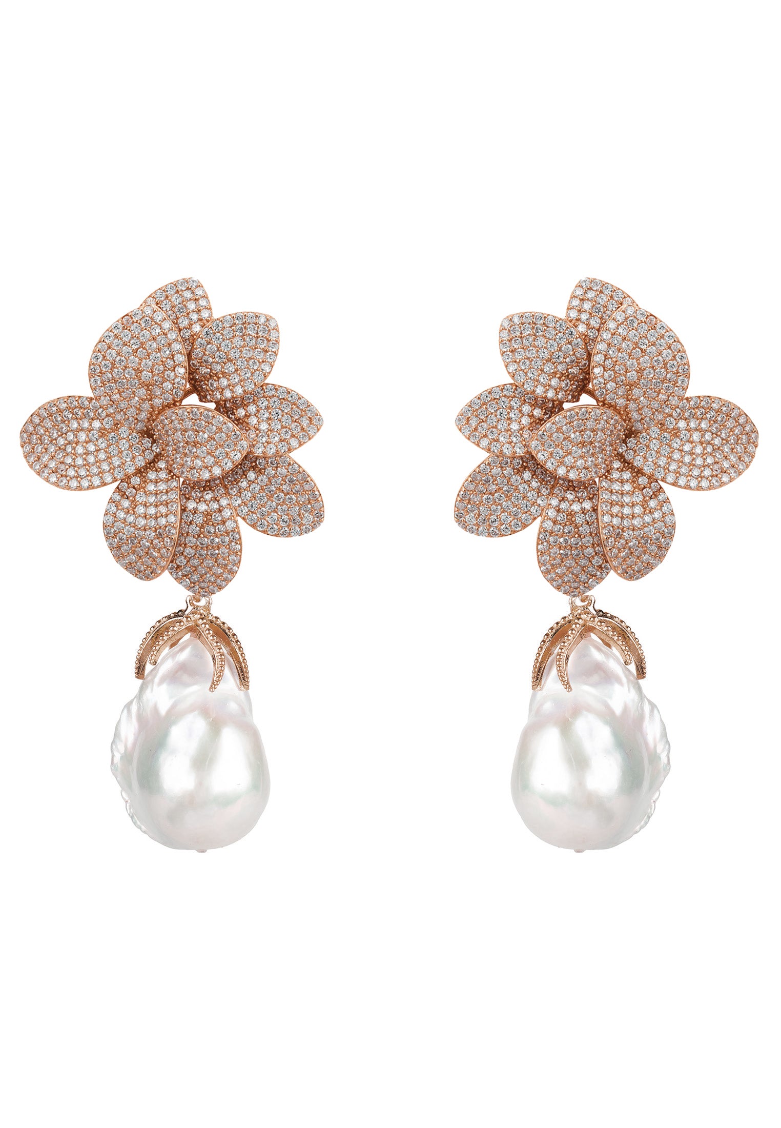 Rose gold flower-shaped earrings with pearl drops on a white background