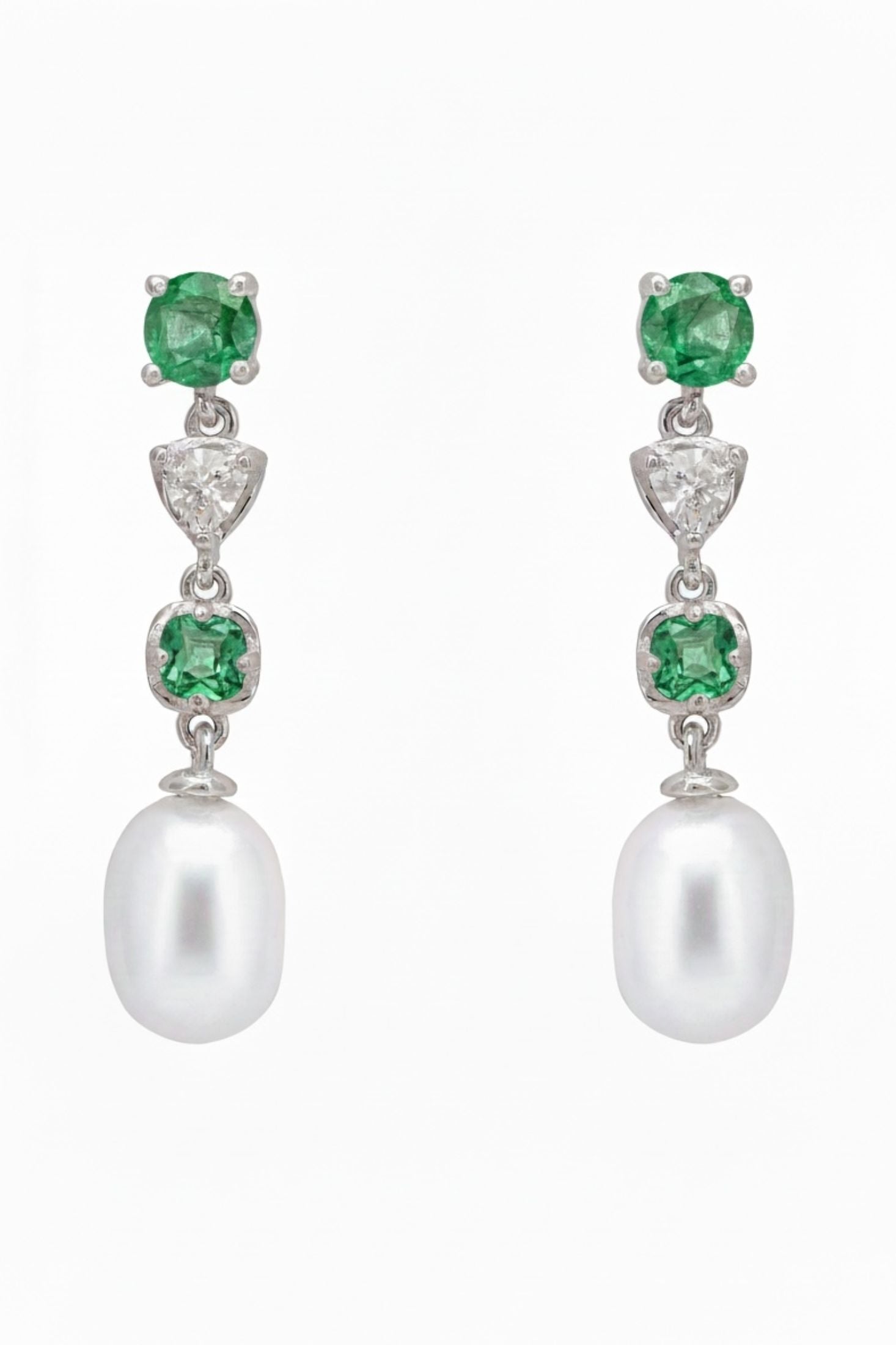 Front view of Pearl Whisper Drop Earrings Colombian Emerald Silver, showing pearl and emerald detailing, silver finish.
