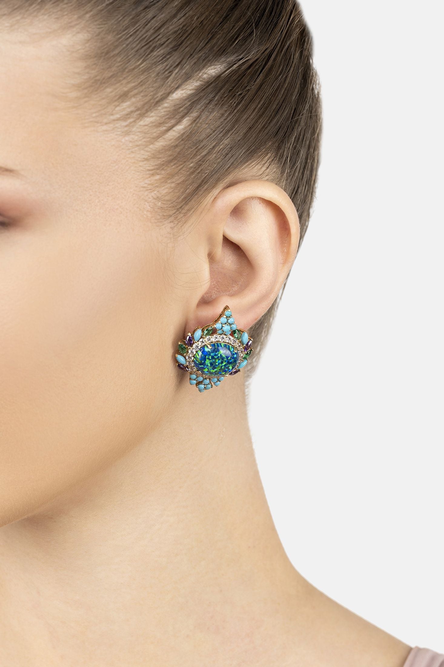 Angled view of Francesca Blue Opal Stud Earrings Gold, showing gold finish and the jewellery profile.