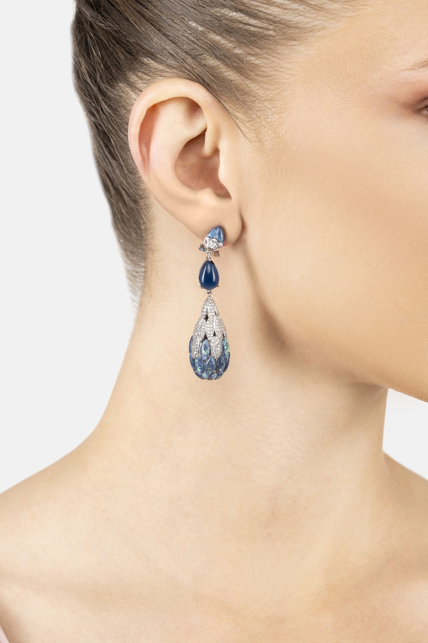 Angled view of Carmen Green Opal Drop Earrings Silver, showing silver finish and the jewellery profile.