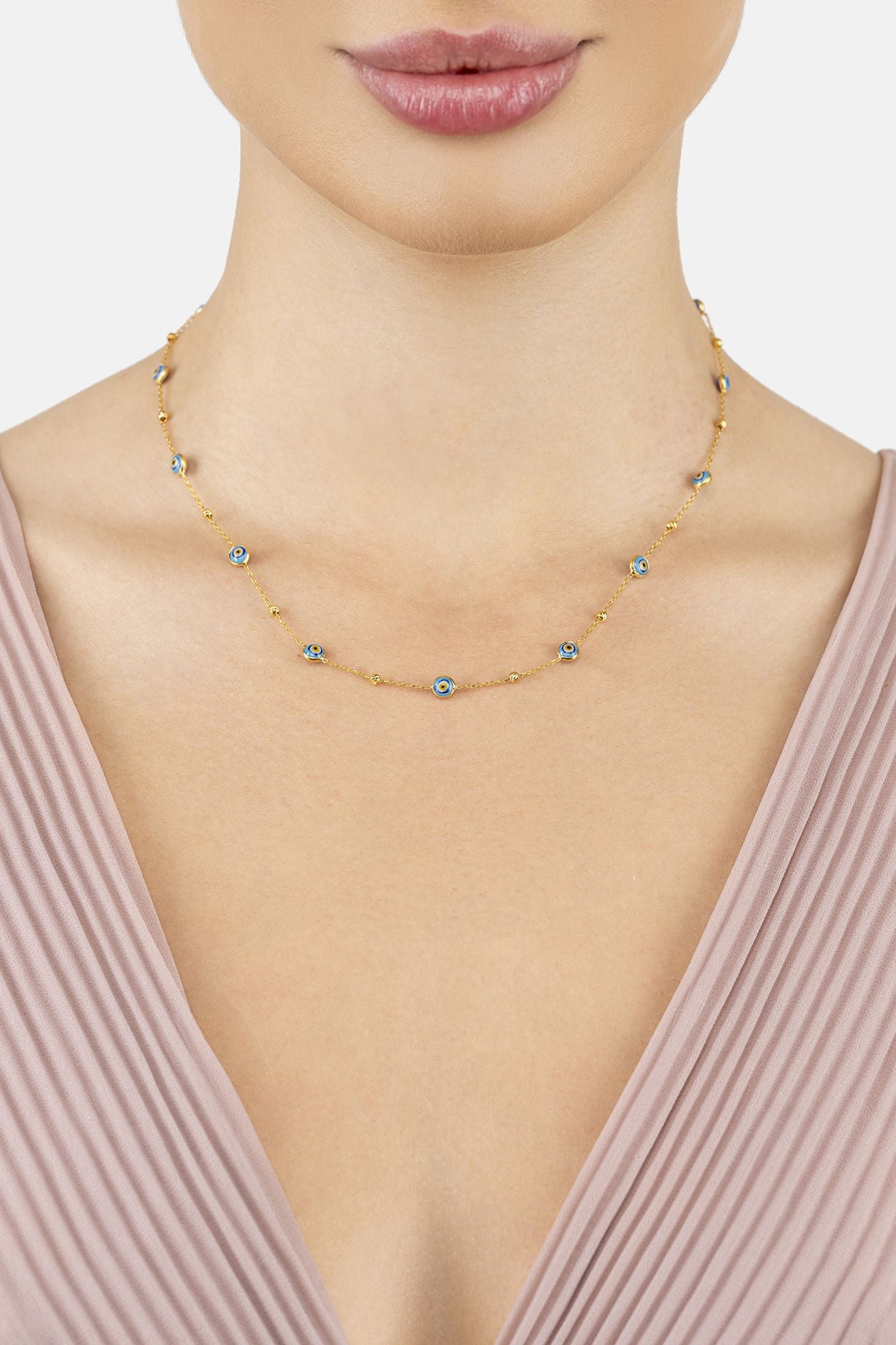 Angled view of Evil Eye Blue Enamel Beaded Chain Choker Necklace Gold, showing evil eye design, gold finish and the jewellery profile.