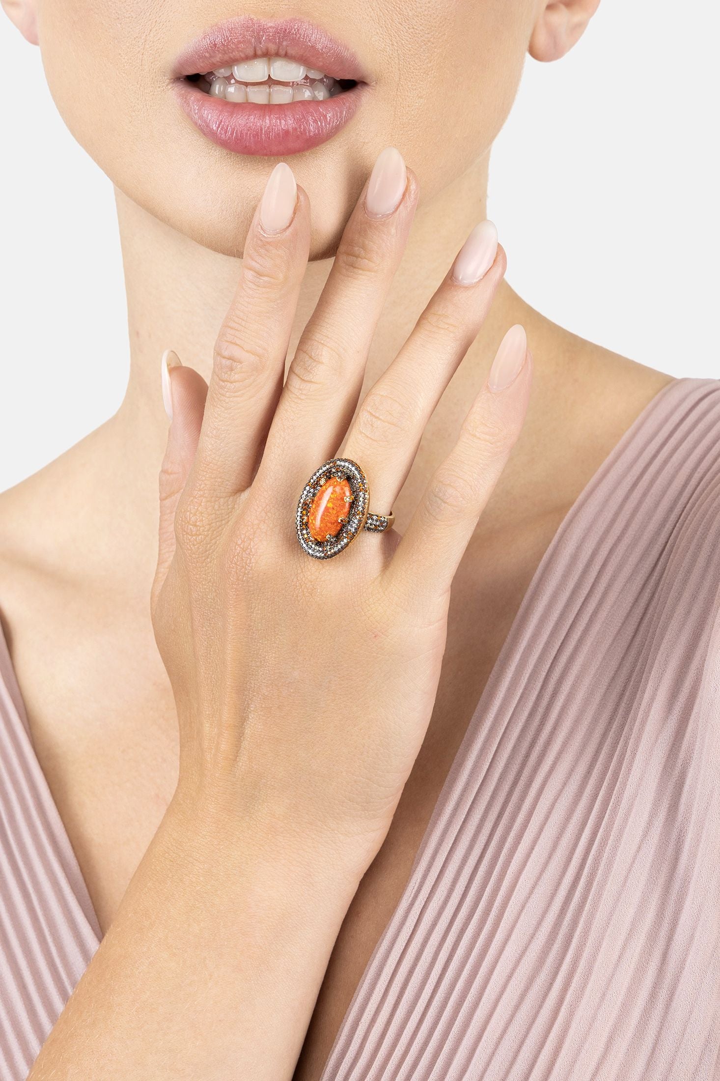 Angled view of Serafina Fire Opal Cocktail Ring Gold Oxidised, showing gold finish and the jewellery profile.