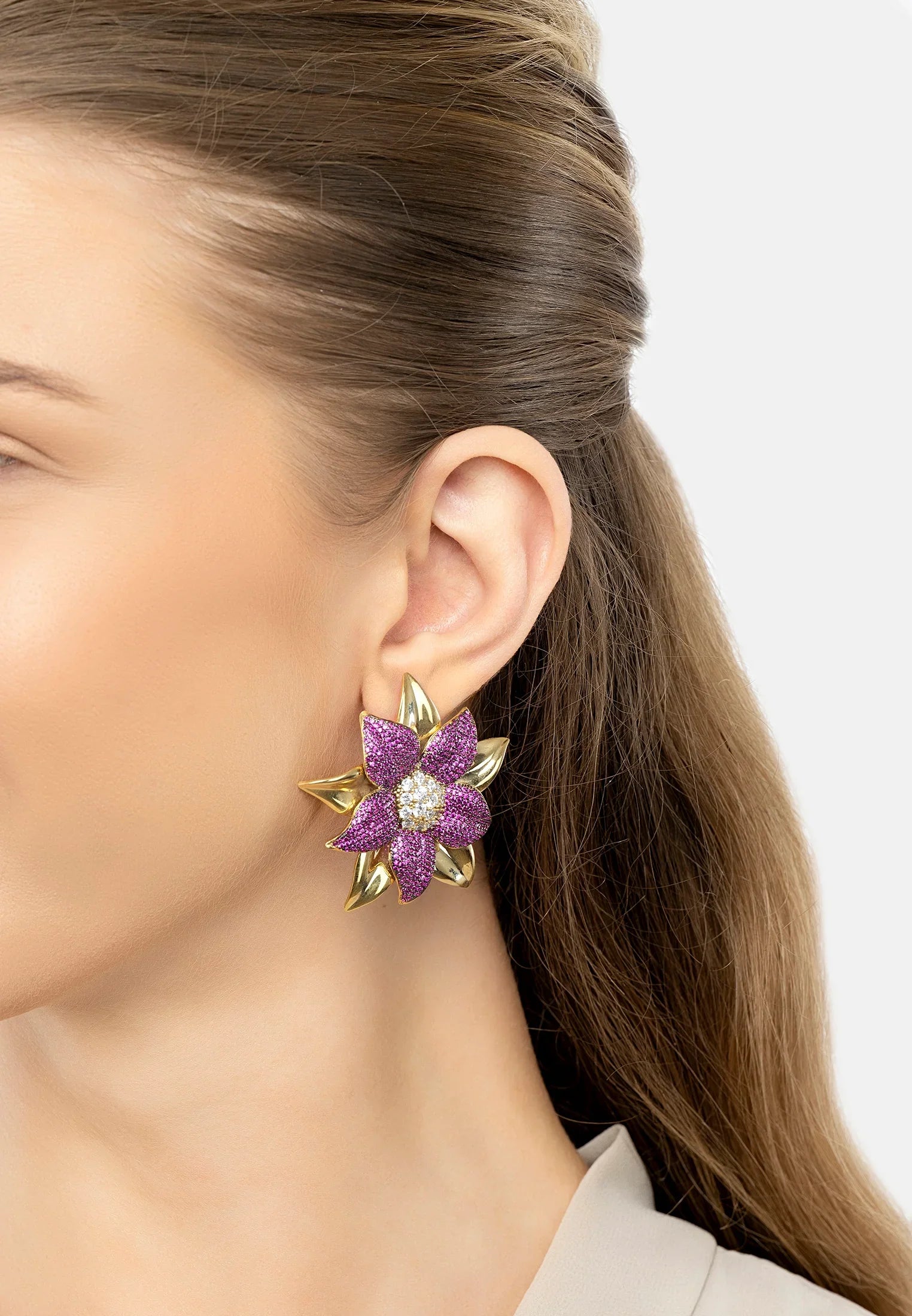 The earring worn by a model.