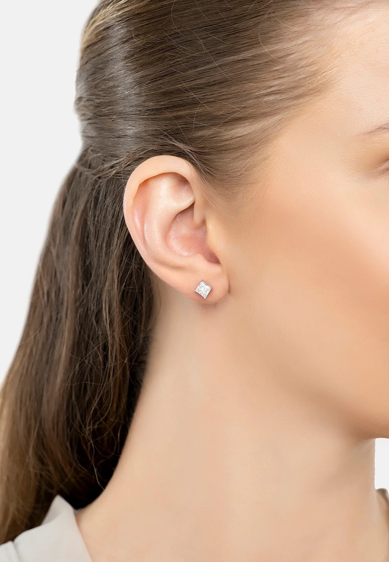 The earring worn by a model.