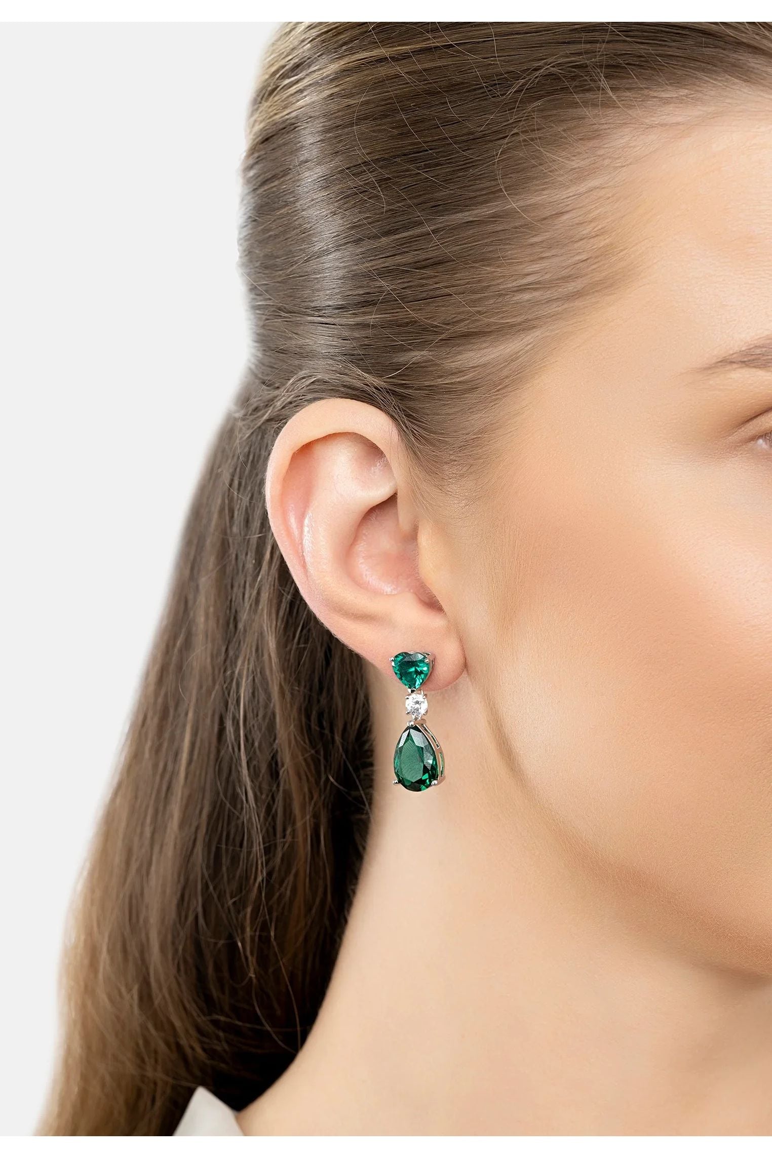 The earring worn by a model.