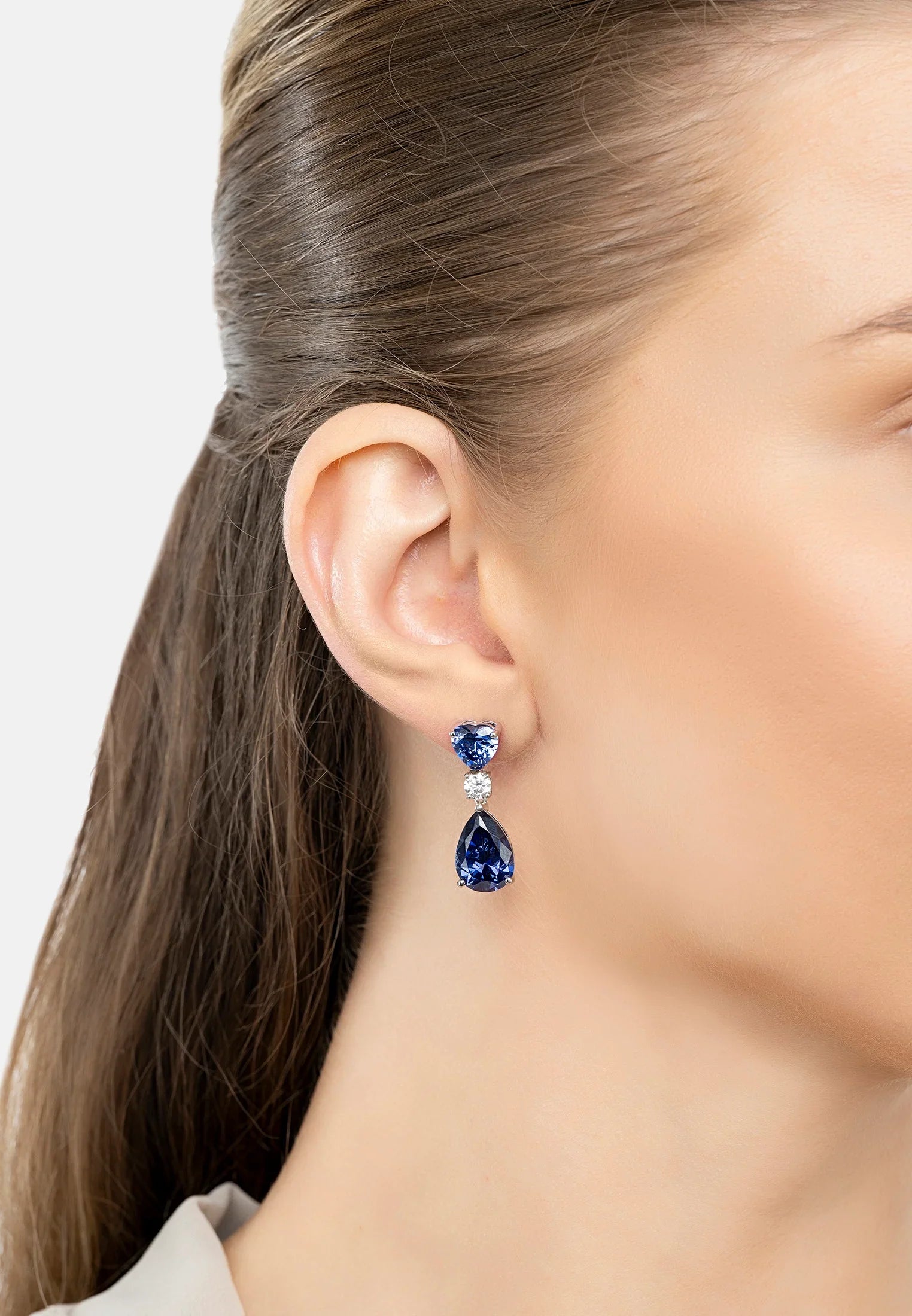 The earring worn by a model.