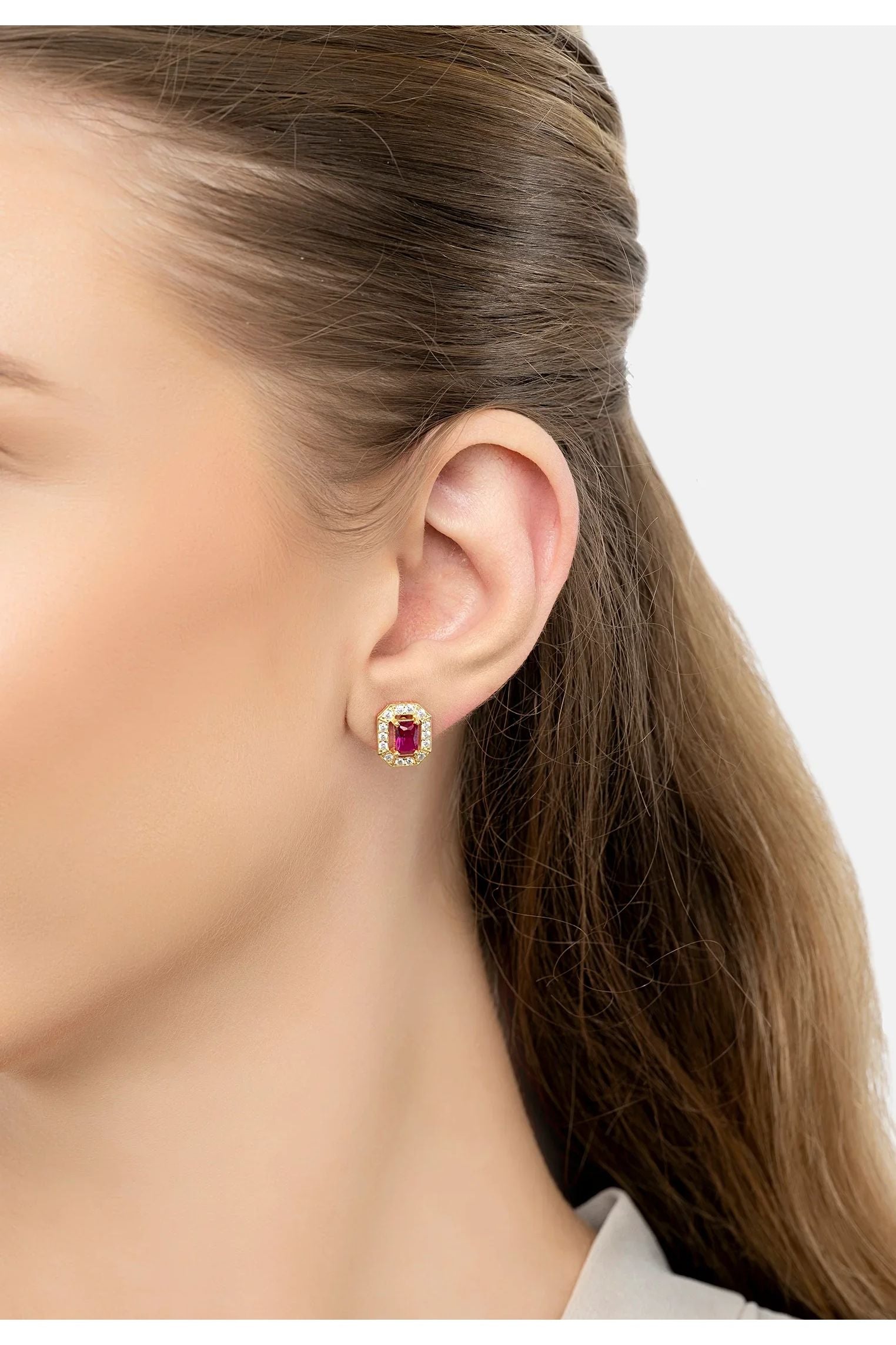 The earring worn by a model.