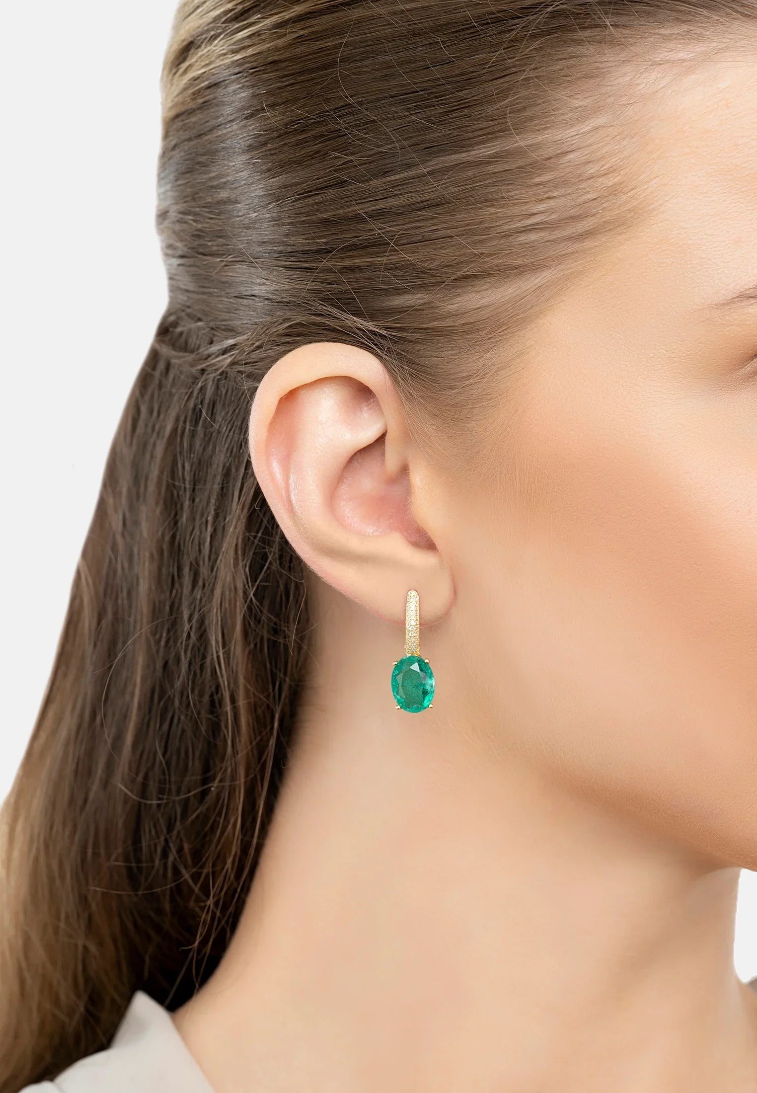The earring worn by a model.