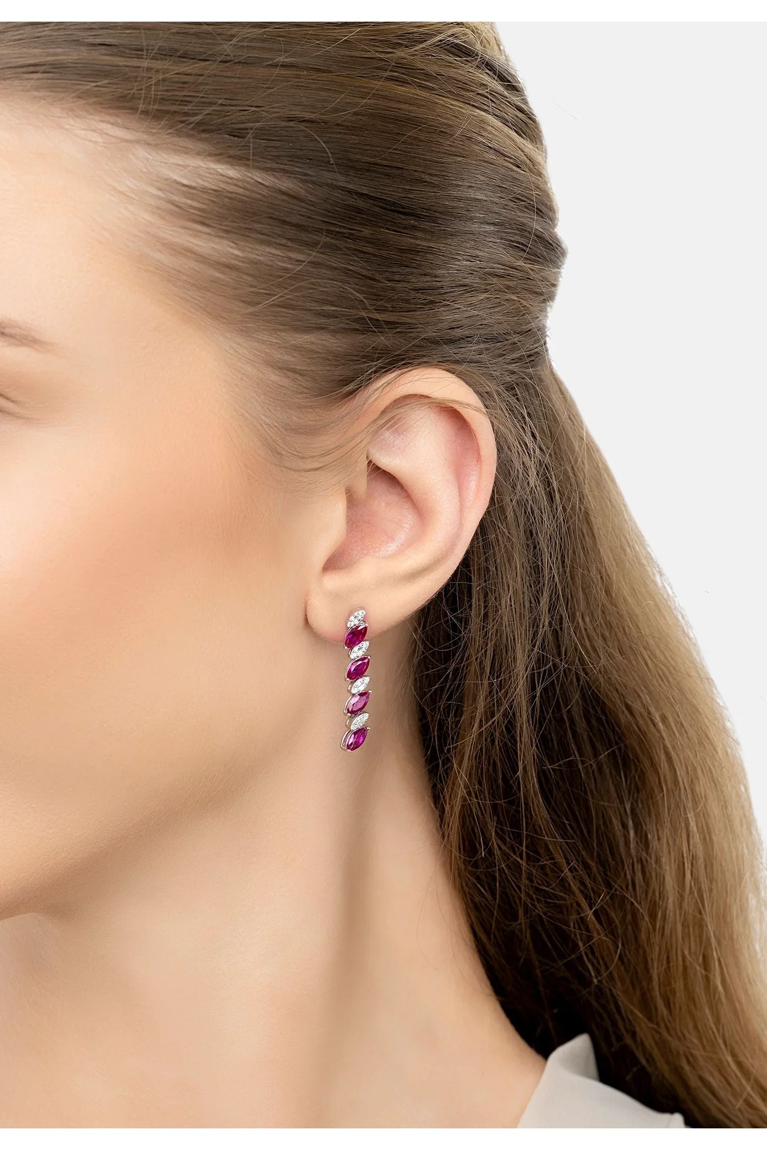 The earring worn by a model.