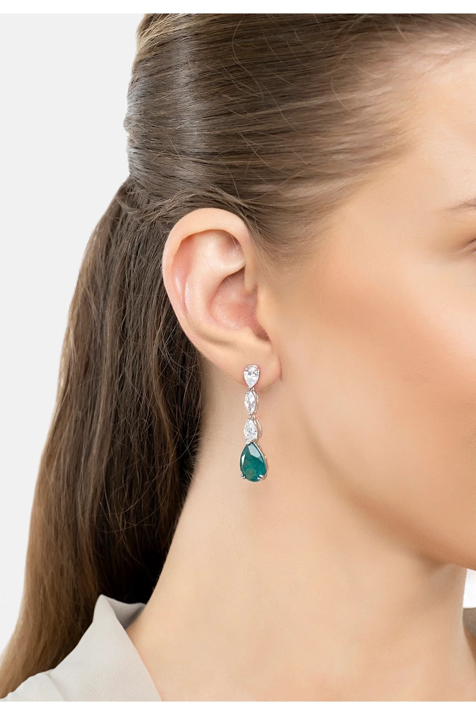 The earring worn by a model.