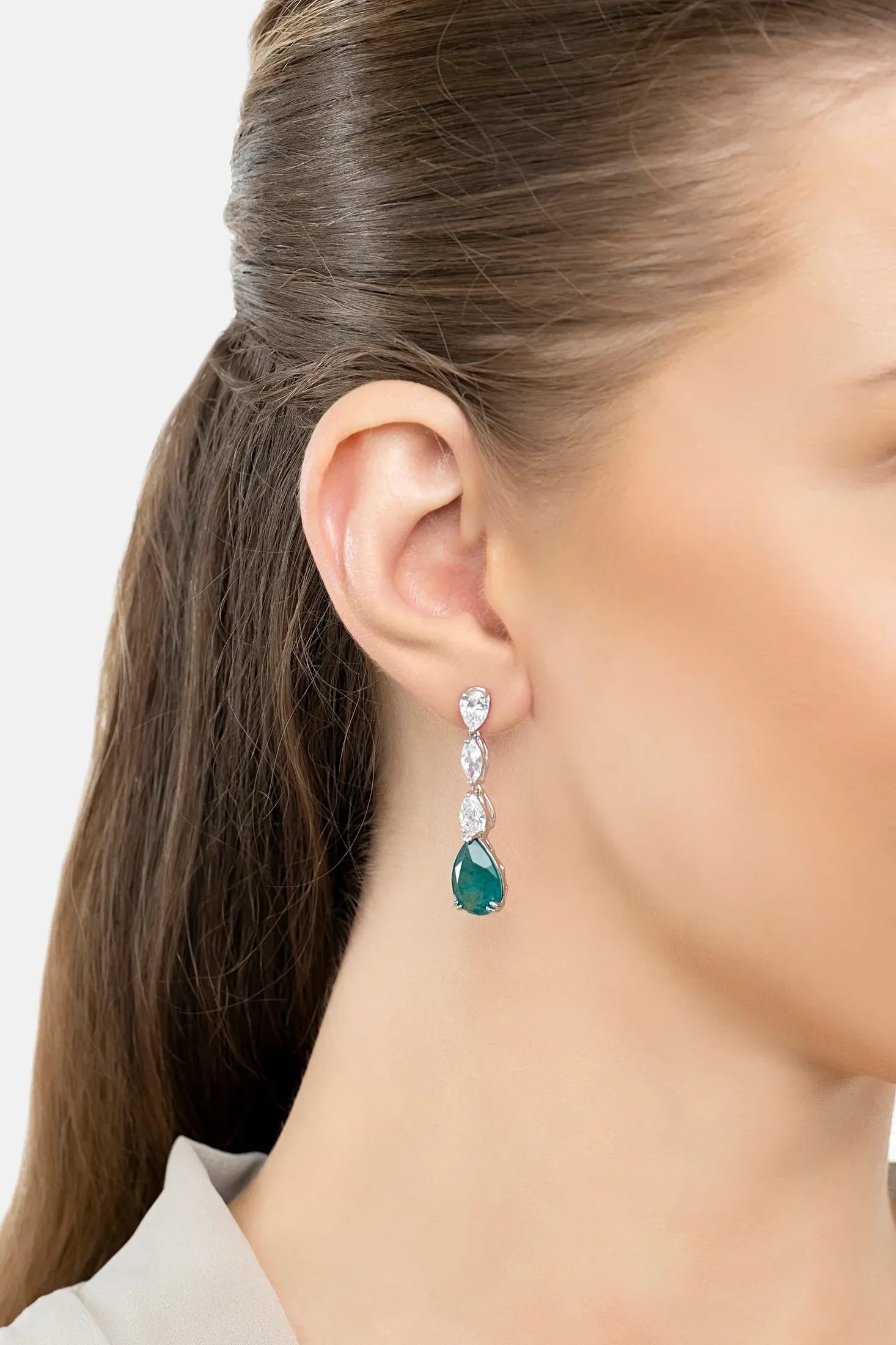 The earring worn by a model.