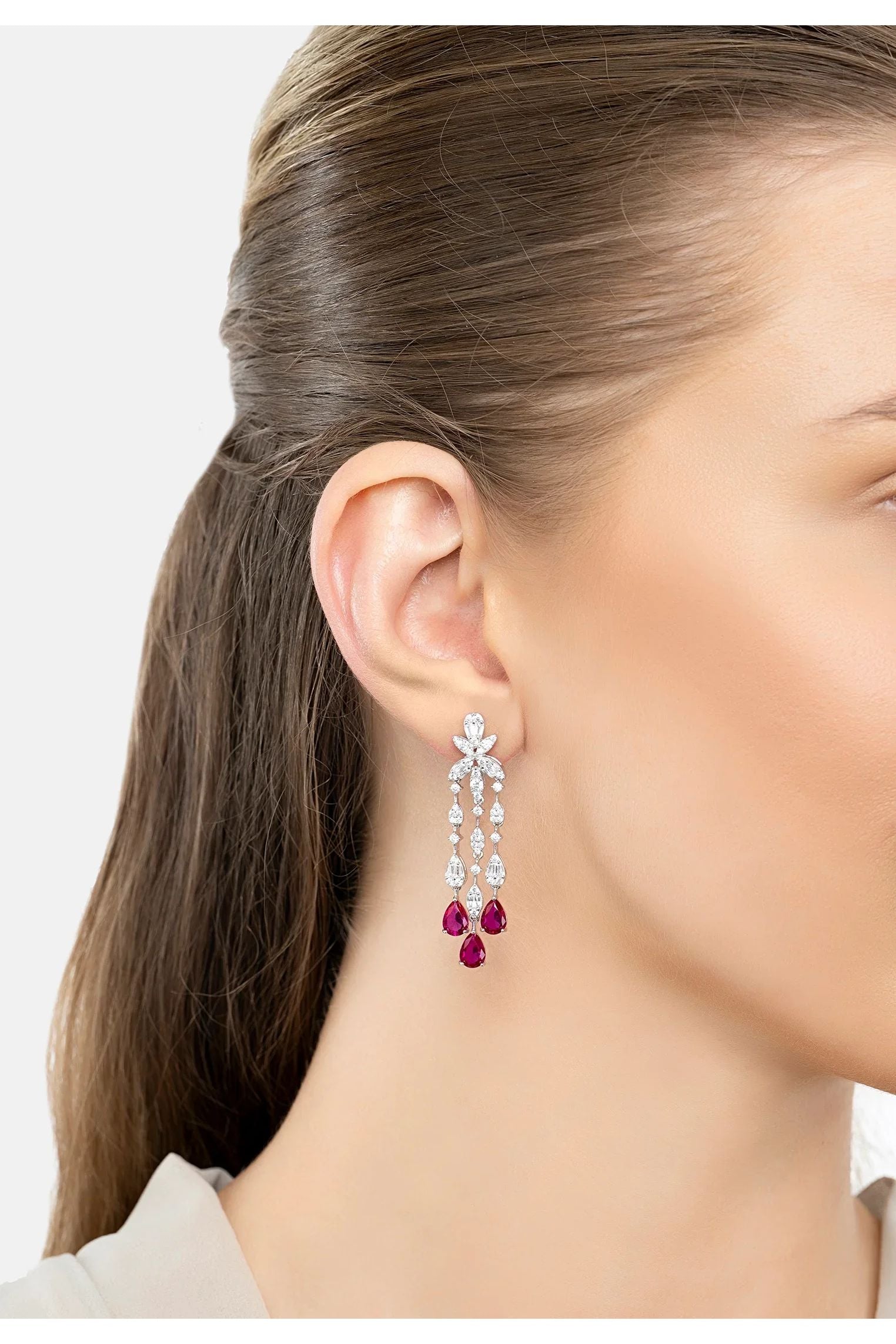 The earring worn by a model.