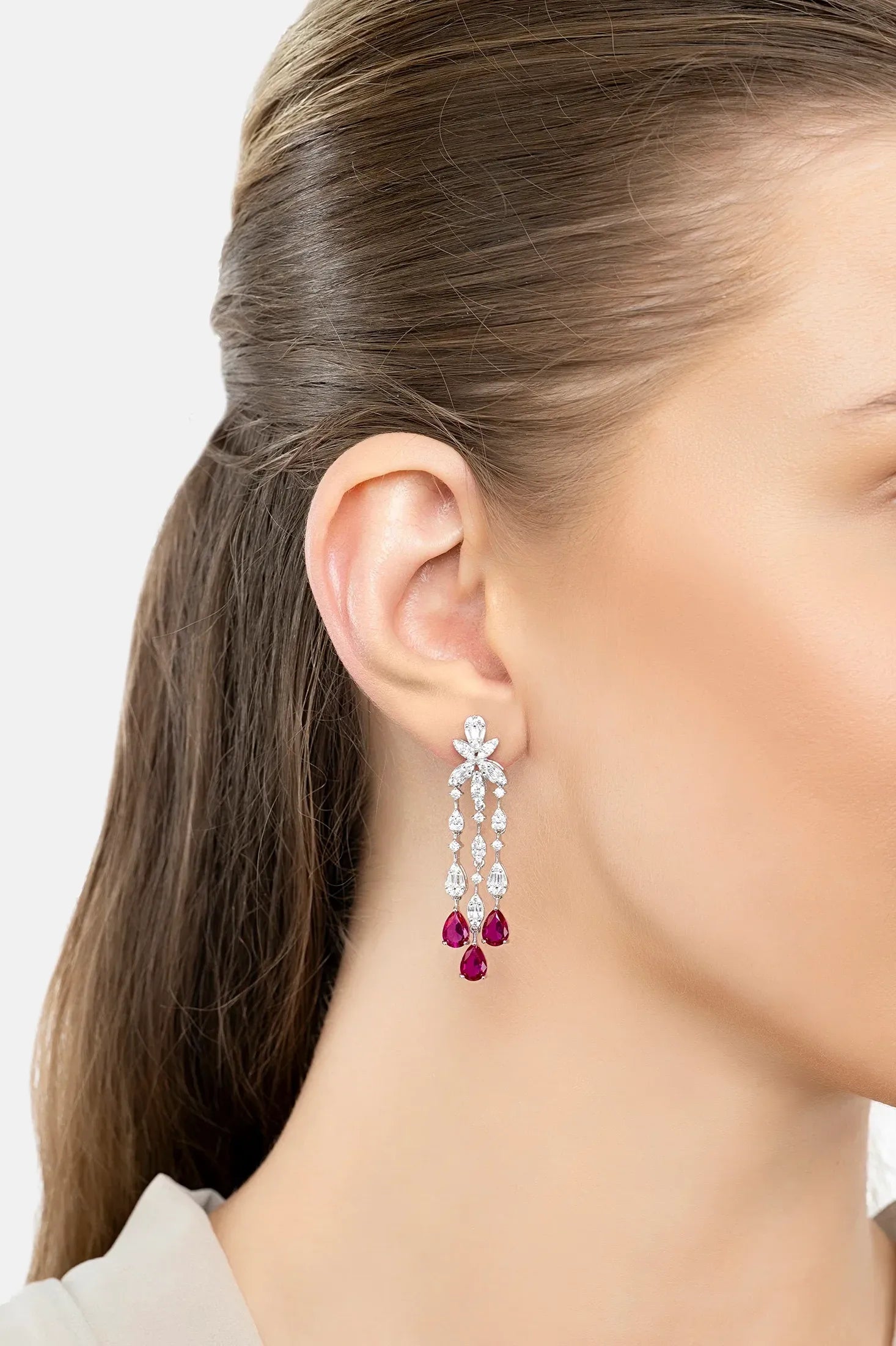 The earring worn by a model.