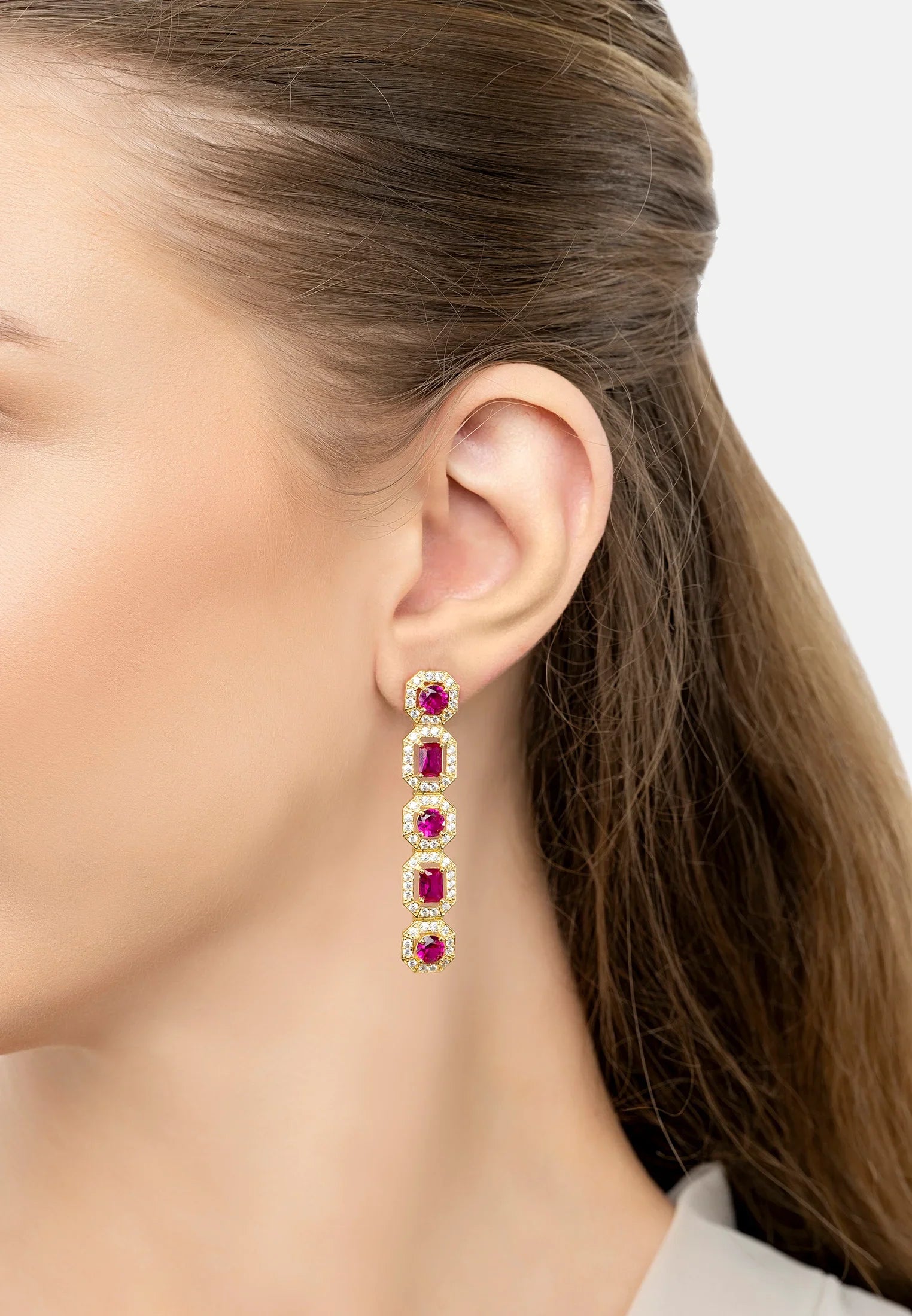 The earring worn by a model.