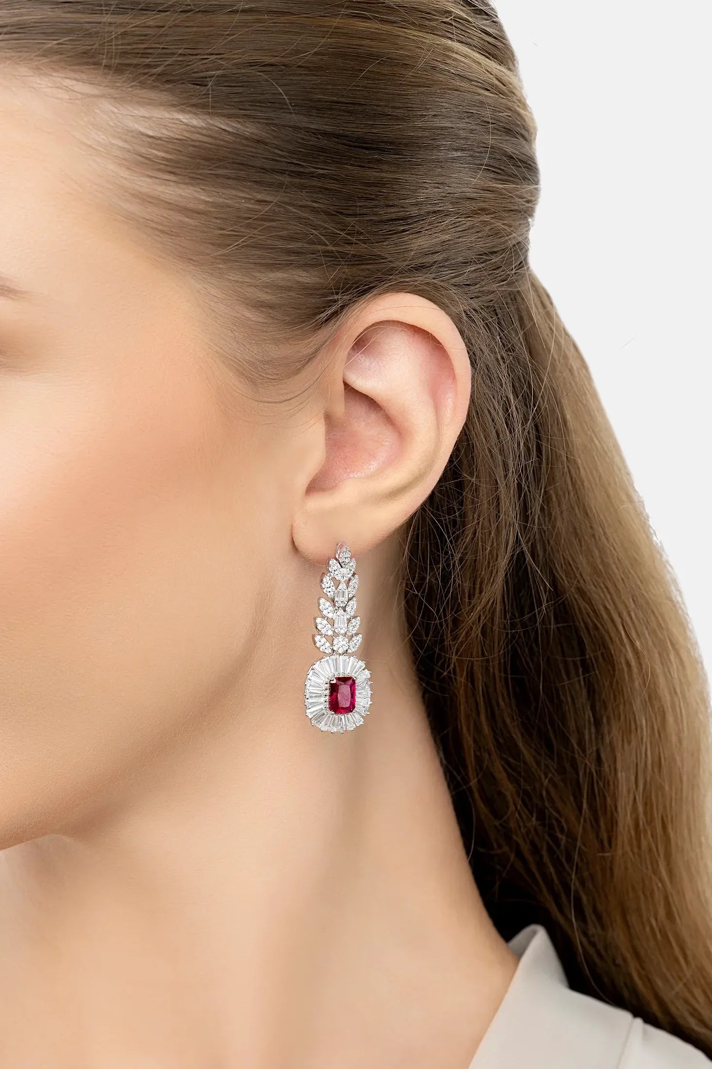The earring worn by a model.