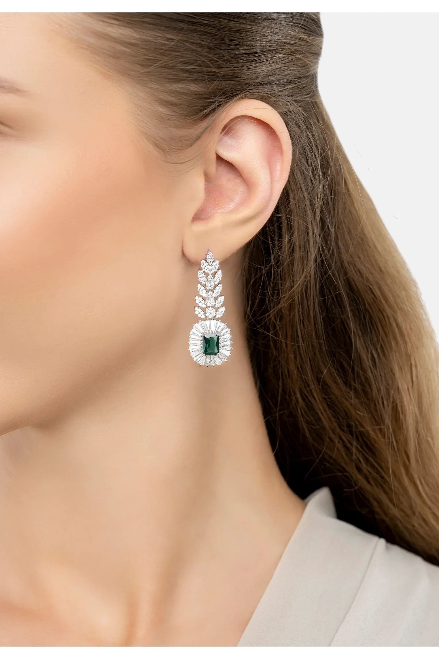 The earring worn by a model.
